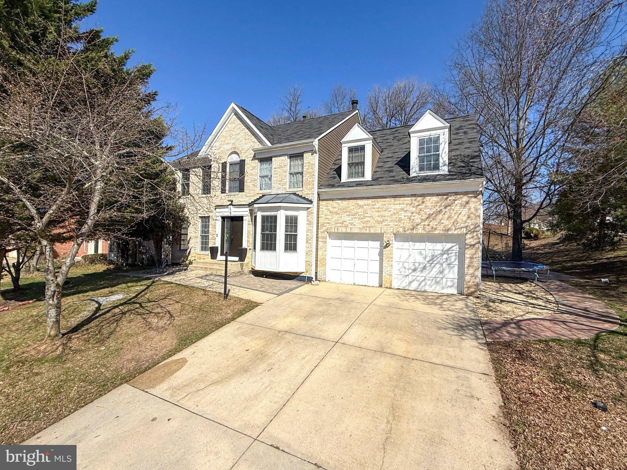 This home has an assumable loan with a great interest rate for a new buyer!!!! Beautiful brick front colonial home in a peaceful community. Completely remodeled, boasts 4 bedrooms, 2 bonus rooms, 3 1/2 baths, office, eat in kitchen, finished walkout basement, covered deck, 2 patios, brick sidewalk, the roof was replaced in 2023,Just a short walk to Lincoln Vista Park with playgrounds, tennis, basketball, and open fields. A rare find in a prime location.
