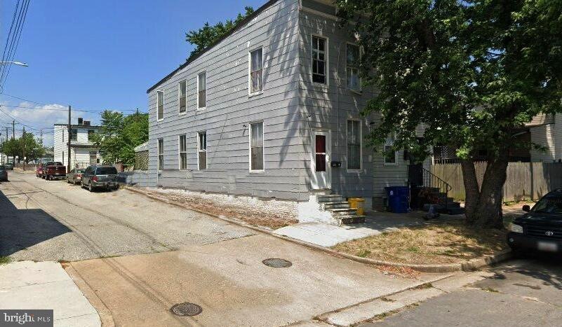 Discover the potential of this charming twin/semi-detached home, built in 1923, nestled in a neighborhood that offers a blend of historic charm and modern convenience. With 1,092 sq. ft. of space, this property is a blank canvas ready for your personal touch. The dirt floor basement provides ample storage or the opportunity for creative renovations. Enjoy the benefits of on-street parking and easy access to local amenities, including parks, shops, and dining options just a short stroll away.  This property is not just a home; it's a chance to invest in a neighborhood that values community and connection. You must be looking to renovate , this residence, in need of total renovation, offers endless possibilities in a location that truly has it all. Don't miss out on this unique opportunity! Please Note.....Discoloration is present in property...POSSIBLE Mold, Tour at your own risk. There is No Power....Bring a flashlight