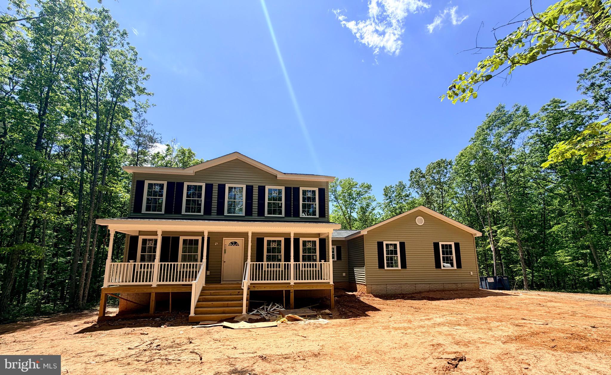 UNDER CONSTRUCTION- MOSBY MODEL- LOT 7 on  2.994 acres. Home will include stainless steel appliances and granite countertops in kitchen, master bathroom with double vanity sinks and walk-in shower; Large covered front porch on the front, unfinished basement with bathroom rough in, and 2 car garage. Still time to make selections. Call today for more info. **first photo is a similarity photo** This home is not under roof yet. FYBERLYNC Available! Please call Fiberlync for more information and confirmation.
