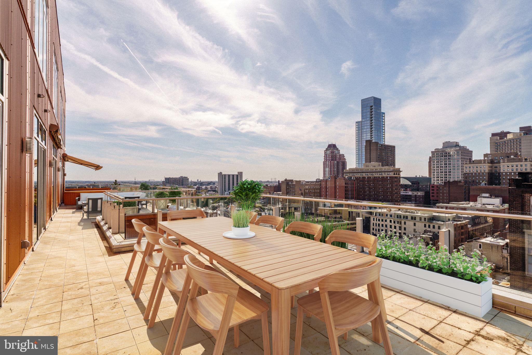 Rarely available, this PENTHOUSE in Washington Square West features an extraordinary 850 sq ft private double TERRACE with retractable awning, offering unmatched outdoor living and breathtaking sunsets over the city with 2 CAR PARKING AND separate STORAGE Room! Low condo fees and nearly 1,800 sq ft of renovated sun-filled space including floor-to-ceiling windows, an open layout with hardwood floors, recessed lighting, and a sleek gas fireplace. The chef’s kitchen with island seating for 6+ is outfitted with new Thermador appliances, quartzite countertops, and custom cabinetry, while the flexible floor plan provides 3 bedrooms or 2 plus a study/media room. Enjoy recently remodeled bathrooms, seven custom closets plus a private STORAGE room as well as 24-hour concierge service, TWO-CAR valet parking, and remarkably low condo fees in a financially stable building that hasn’t had an assessment in over 14 years. Steps from Jefferson Hospital and minutes to both Rittenhouse and Washington Squares, this is Center City living at its finest.