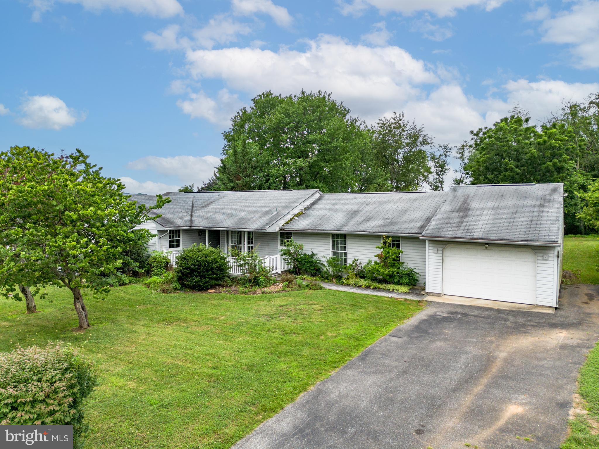 Great opportunity to make the  Patapsco Estates home your own . This  Garage Rancher with 4 bedroom and  2 baths sits on  a gorgeous .58 acres lot with trees for privacy.  You will love the backyard. Loads of parking on HUGE driveway and street parking as well.    This home offers so much potential and is ready for someone that wants all the benefits of Sykesville and Carroll county has to offer The neighborhood   connects to the Sykesville Linear trail which leads to Patapsco River. You can actually  are in walking distance to Main Street in Downtown Sykesville as well. Just minutes from I-70 and Route 97 for easy access to everything.