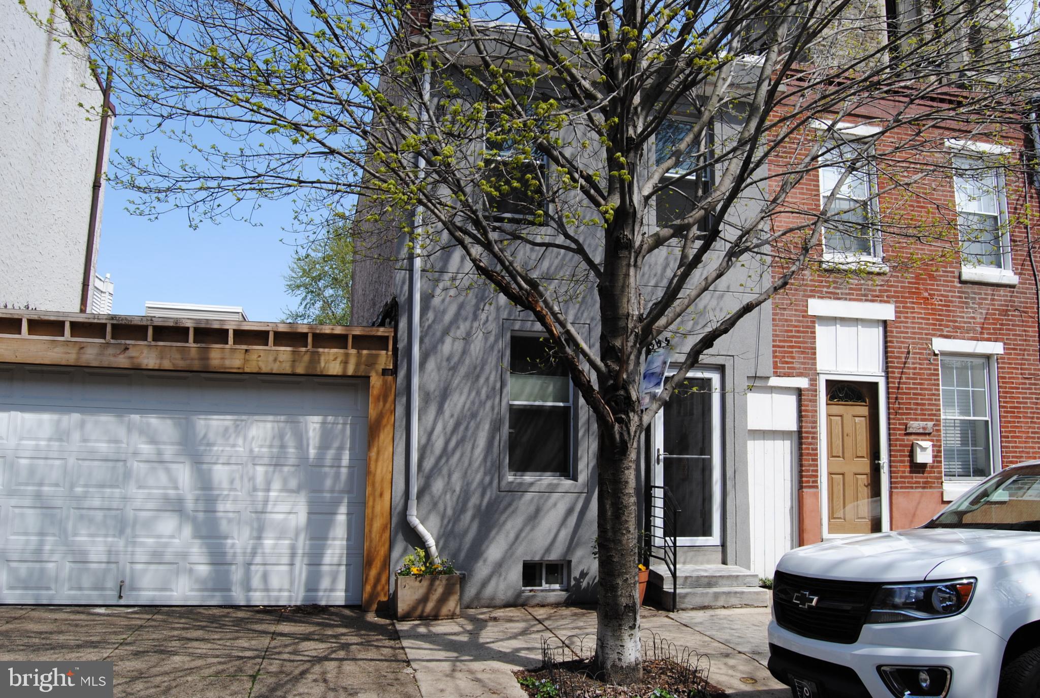 Prime , prime Fishtown block !! Modern front , formal  living room with newer hardwood  flooring .Beautiful gourmet kitchen with granite counter top , large counter eating area , newer stainless steel appliances including dishwasher, microwave,gas  range , stainless steel sink ,and rear open eating area , Exit slider door  to rear maintaince free private fenced yard with butterly garden .Side shared trash alley . Finished basement with berber carpets,  full bath with  stall shower,ceramic tiled walls and stone flooring,  rec room area being used as lower bedroom .Laudry closet in basement . Heater and central air about 2yrs old . Large master bedroom with vaulted ceiling and newer wood flooring ,ceiling fan, and recessed lights.  Modern hall bath with ceramic tiled floors and walls . 2nd bedroom with vaulted ceiling, recessed lights and ceiling fan . Large hall loft storage area . Custom modern railings. Come and view today !