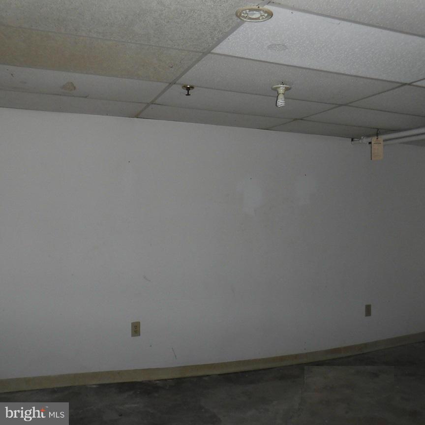 Take advantage of this awesome opportunity to own this value priced home! Enjoy spacious room sizes, full bath on each floor and fully fenced yard. Use the finished basement for added living and storage space. The covered front porch, rear deck and backyard are perfect for warm weather relaxation and entertainment. Off street parking. Convenient location; just a short drive to downtown Baltimore.