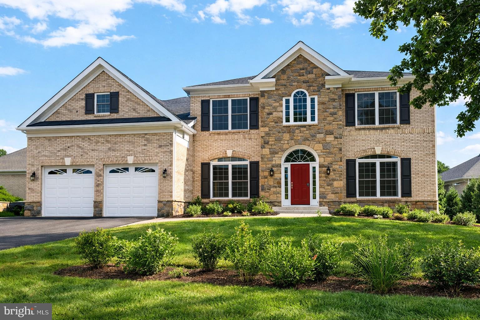 Welcome to this spectacular custom residence perfectly situated on a premium end-of-street lot in the heart of McLean. Built in 2015, this magnificent home boasts 6 bedrooms, 6 full bathrooms, and 7,660 beautifully finished square feet across three grand levels with soaring ceilings (10' main/9' upper & lower).  Pass through the striking brick-and-stone facade into a breathtaking two-story entry foyer anchored by a custom architectural rotunda and elegant 4” oak hardwood floors. The main level is designed for effortless entertaining, featuring a formal living and dining room with exquisite 4-piece crown molding, a sun-drenched morning room with French glass doors, and a spectacular family room defined by a coffered ceiling and a stone-surround gas fireplace. The gourmet chef’s kitchen is a masterpiece, outfitted with off-white custom cabinetry, a massive contrast-cherry island with a secondary veggie sink, and a commercial-grade appliance suite featuring a 48” Wolf dual-fuel range and a 48” Sub-Zero built-in refrigerator.  The upper level introduces brand-new Maple hardwood floors leading to a sprawling primary suite complete with two massive walk-in closets and a spa-like bath featuring a frameless custom tile shower and jetted soaking tub. The fully finished lower level features 9' foundation walls, an expansive recreation area, a dedicated media room pre-wired for 5.1 surround sound, a full granite wet bar, and a private au pair/guest suite. Outside, enjoy low-maintenance luxury with a Hardie-plank rear, flagstone walkways, and a private back patio. The oversized 2-car garage comes equipped with a pre-installed Tesla Wall Connector. Unbeatable walkable location—just minutes to the McLean Metro Station, McLean High School, and downtown dining/shopping with instant commuter access to I-495, I-66, and the Dulles Toll Road!