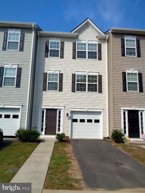 Spacious 3 level townhome with 3 bedrooms, 2 full baths, 2 half baths. Features new carpet,  granite counter tops, deck and 1 car garage. Convenient location close to Fort Walker and  I-95. Pets are considered case by case.  Available immediately.