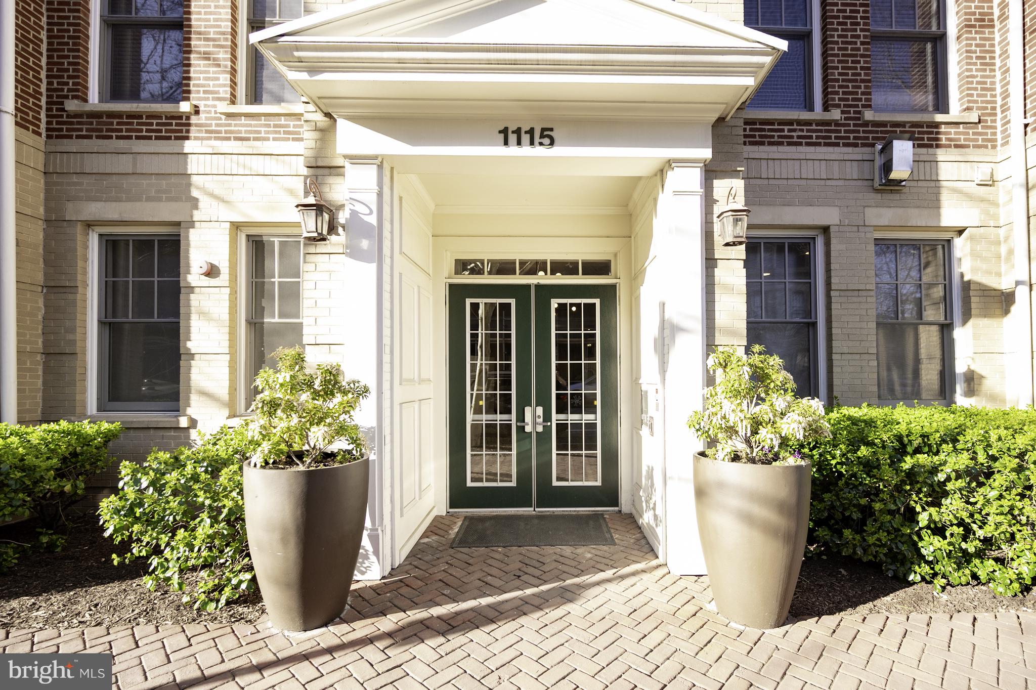 This charming 2-bedroom, 2-bathroom condo at The Prescott offers an ideal location just off King Street in Old Town Alexandria. Featuring a private balcony overlooking the courtyard area, close to nature.  This light-filled home is perfect for comfortable living.  Primary suite with large walk-in closet, en-suite bathroom with separate shower and soaking tub, as well dual vanities. Second large bedroom with walk-in closet and en-suite bathroom that also accesses living area. The spacious kitchen boasts a breakfast bar, granite countertops, gas range, and extensive storage, making it perfect for both everyday use and entertaining. Large laundry room and spacious pantry in the unit as well as a new water heater.
Residents of The Prescott enjoy a pet-friendly community and access to a range of desirable amenities, including beautifully maintained common areas, a park-like rooftop deck, and a convenient underground garage parking spot. Condo fees cover water, trash, snow removal, building maintenance, lawn care, management, and reserve funds, making for a hassle-free living experience.

Just three blocks from the King Street metro and surrounded by top-rated Old Town dining options offering a variety of cuisine, shopping, and a vibrant arts and entertainment scene just moments away. Great proximity to the Pentagon and DC.  Whether you're heading to the waterfront or the Metro, you'll be perfectly positioned for both work and play.