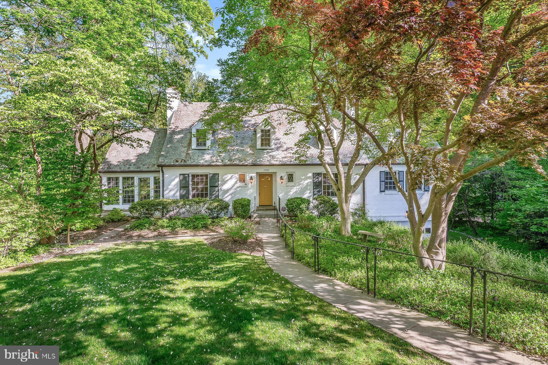 Welcome to 5300 Boxwood Court, a spacious, move-in ready Cape Cod with generous room sizes, located in desirable Westmoreland Hills.  This handsome home is sited on the second largest lot in the neighborhood and provides amazing vistas of mature trees and seasonal reservoir views.  Beautifully and extensively renovated top to bottom starting in 2008 and completed in 2010, nothing has been overlooked.  The main level boasts a welcoming foyer with large coat closet and powder room; expansive living room with fireplace and custom built-ins; spacious dining room with French doors leading to an enormous deck; handsome study with custom built-ins; chef’s kitchen with commercial appliances adjoining a great room reminiscent of Aspen, with a huge fireplace and beamed ceiling and a large sun porch surrounded by greenery.  The second floor boasts 4 large bedrooms and 3 full bathrooms.  The walk-out lower level has 9’6” ceilings and provides a large recreation room with a fireplace, an impressive wine cellar, large bedroom and full bathroom, laundry, storage and more.   The brick exterior, slate roof, wrought iron railings, extensive custom stone work with two-tiered flag-stone patios are just a few of the beautiful features of this gorgeous home.  The piece-de -resistance is a free-flowing heated pool nestled among the trees and a fun sport court for outdoor activities serves as an added bonus.  Rarely does such a lovely home located in such a desirable spot come to market.