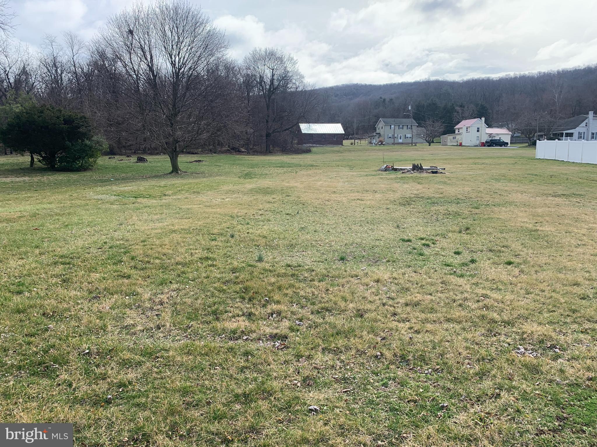 Building lot in the Mt. Holly Springs Borough with private setting. Public water available to the site however property has not been perced and probed for an acceptable septic system. There was a home on the lot at one time but unsure whether there was a septic system.