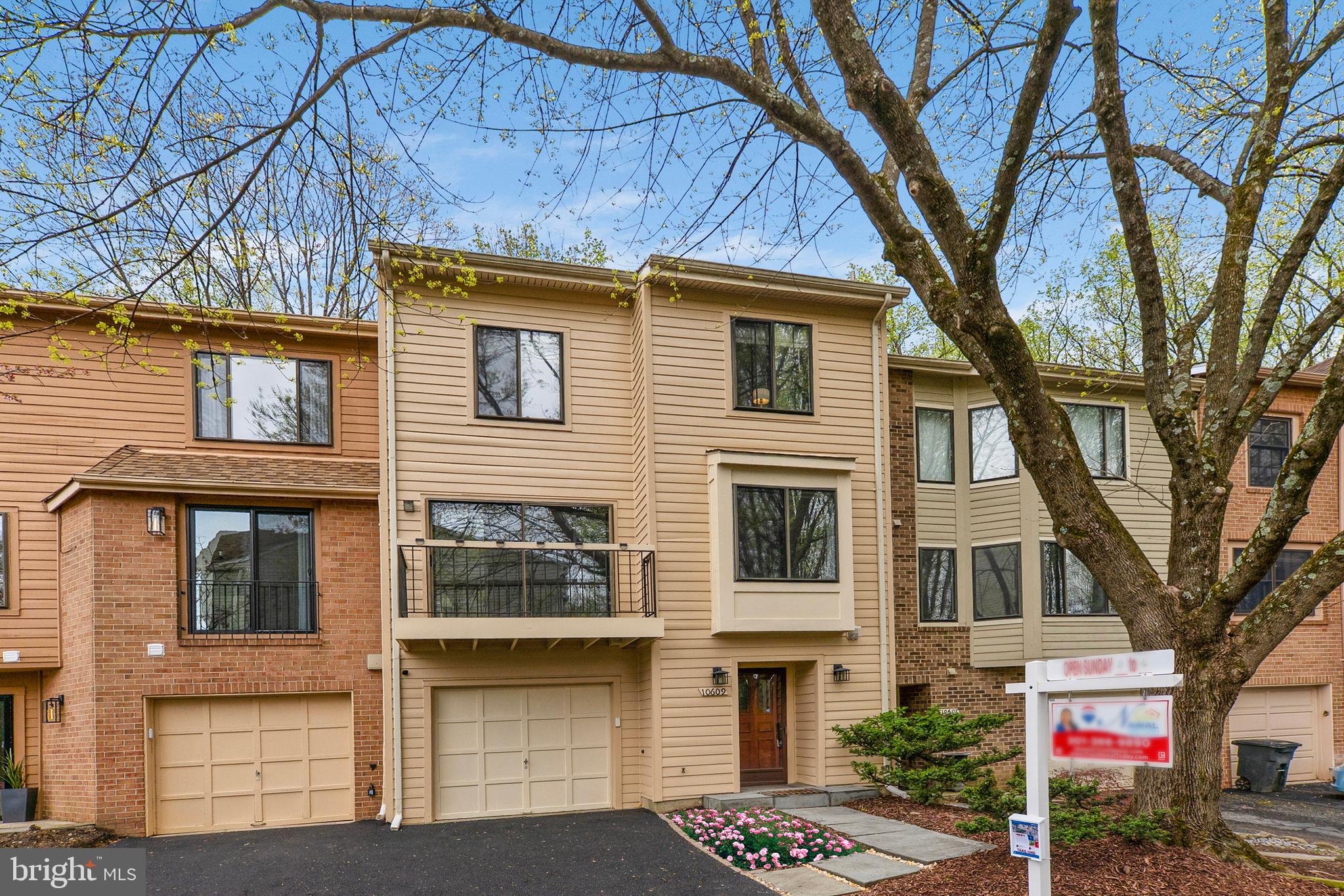 Welcome to 10609 Mist Haven Terrace in the desirable Timberlawn neighborhood. This townhouse is ideally situated just minutes from the Grosvenor Metro and offers convenient access to a range of shops, restaurants, and amenities along Rockville Pike.
Located on a private no-thru traffic street with additional visitor parking, this home backs to beautiful trees providing increased privacy. The thoughtfully designed layout features a living area that can serve as an in-law suite, complete with a half bath on the entrance floor. The main level includes a spacious living room, dining room, kitchen with a breakfast area, and an office that can also function as a fourth bedroom, along with another half bath. The upper level encompasses three bedrooms and two full baths.
Additional highlights of the home include an attached garage and driveway, a cozy balcony off the living room, and a generous deck off the dining room, ideal for entertaining. The property also features an open entry foyer, cathedral ceilings in the upstairs bedrooms, and a primary bathroom equipped with a skylight, a soaking tub and shower. Additionally, a wood-burning fireplace is present in the entrance-level living room.
