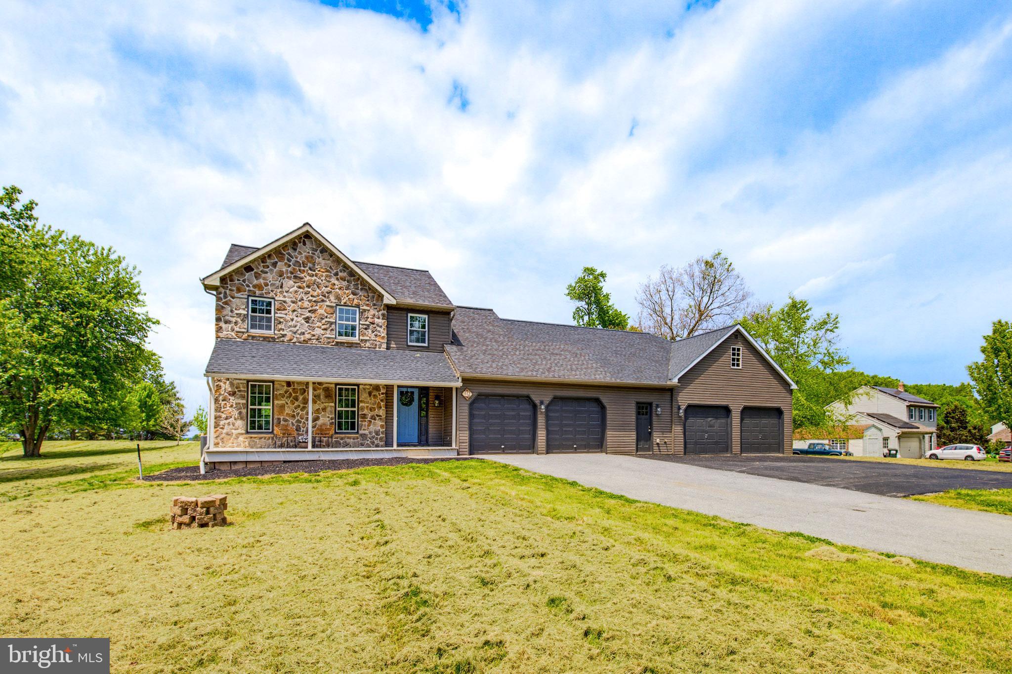 Welcome to 112 Saw Mill Road, a beautifully expanded and renovated home situated on a private and unique 1.6-acre setting in Lancaster County. Featuring a substantial addition completed in 2022, this property offers over 4,800 square feet of finished living space with a thoughtfully designed layout that supports convenient first-floor living. Throughout the home, detailed custom trim work and quality finishes add warmth and character, while the expansive floor plan provides flexibility for a variety of living arrangements. The property also offers excellent potential for in-law quarters or extended living space, making it ideal for multigenerational needs. Additional highlights include a finished basement providing even more functional living and entertaining space, along with an impressive 4-car garage setup that offers ample storage and the potential for a workshop, hobby space, or additional utility use. Surrounded by privacy yet conveniently located near local amenities and major routes, this home combines space, craftsmanship, and functionality in a highly desirable Lancaster County setting.