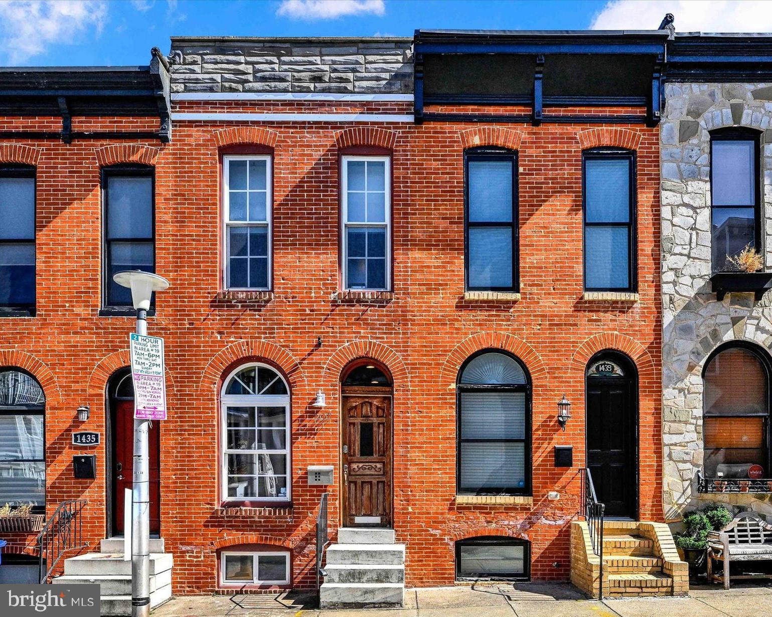 Welcome to 1437 Henry Street!

Experience the best of city living in this beautifully updated 2-bedroom, 2.5-bathroom townhome in Baltimore’s Riverside neighborhood. This home blends historic charm with modern upgrades, featuring exposed brick walls, original hardwood floors, and recessed lighting throughout.

The main level offers a bright and inviting living room, a stylish kitchen with granite countertops and stainless steel appliances, a dedicated dining area, and a half bath. Upstairs, you’ll find two spacious bedrooms, each with its own full bathroom, along with a laundry area and access to the expansive rooftop deck—perfect for entertaining or taking in views of the city skyline.

The finished basement provides a versatile space ideal for a recreation area or home office, plus a utility room for additional storage. The rear deck provides easy access to the private driveway, ensuring convenient off-street parking.

Recent updates include a brand-new furnace with warranty (2024), a refrigerator (2022), and a hot water heater (installed in fall 2020). Additionally, Henry Street is currently undergoing improvements: temporary construction and installation of all-new gas meters from BG&E for each home and fresh road repaving.

Ideally located within walking distance to Riverside Park and just minutes from Federal Hill, Locust Point, scenic waterfront areas, and some of the city's best dining spots, this home is truly a must-see. Schedule your showing today!