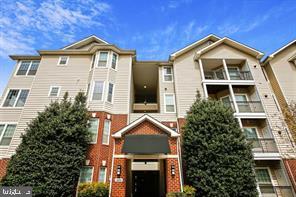 Back on the market because buyer loan failed. Well priced, conveniently located, updated 1BR, 1BA condo in McLean! Being on the top level in an end unit with close to elevator access gives you convenience, privacy, security, and quiet living. New LVP floors in living/dining room and bedroom. Kitchen has white cabinets, stainless-steel appliances, and new granite countertops. Bathroom has new granite countertop with white cabinets. Kitchen, living /dining room and bedroom were just painted. Washer and dryer conveniently inside the unit. Outdoor deck with storage overlooking swimming pool. Comes with 1 assigned parking (space #396) with additional parking for guests outside the gate. Additional assigned parking spaces can also be purchased as they become available. Low condo fee includes water, sewer, and trash. This gated community has so many luxurious resort-style amenities. Swimming pool, heated spa, fitness center, sauna, clubhouse, sports courts, tot lots, walking paths with pet stations, BBQ grills, and electric vehicle charging stations on site! Location is one of the best in the DC Metro area with quick access to I-495, Rt 7, I-66, Rt 123, and Dulles Toll Road. Only one block from the Silver Line McLean Metro Station. Walk to Wegman's across the street. Take advantage of world class shopping and restaurants at Tyson's Corner!