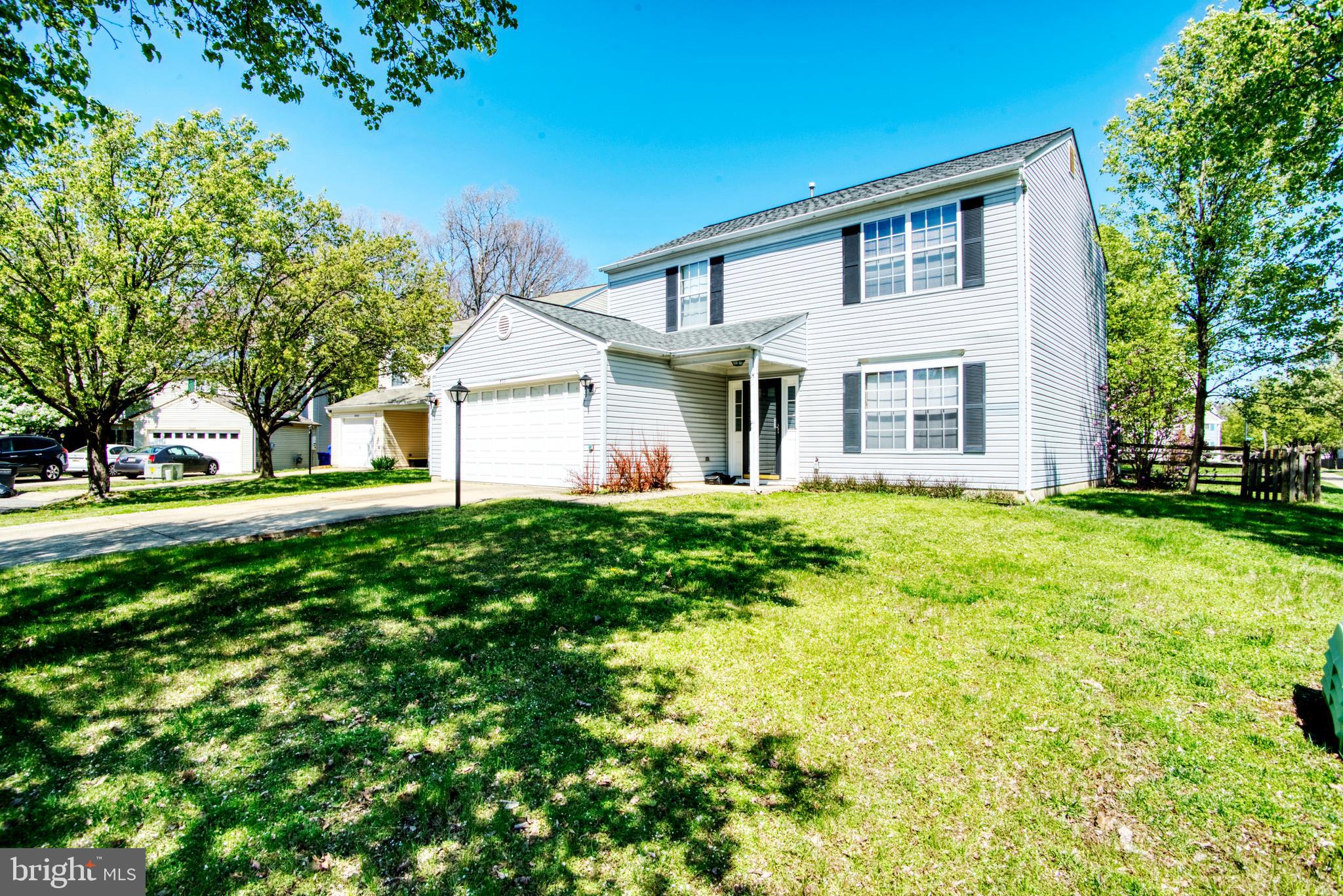 Bright and Spacious Starter Home!! This colonial sits on a landscaped, premium corner lot in a cul-de-sac just walking distance from Wade Elementary school.  Features 3 bedrooms, 2 and half baths in beautiful Dorchester Neighborhood.  The master bath was upgraded with a granite walk in shower.  The 2nd full bath was just remodeled.  FRESHLY PAINTED the two full baths upstairs, (New hardware to be installed in guest bathroom) the stairway walls and one of the walls in the kitchen.  This property offers 1,640 square feet of living space.  Did I mention that your  new home is close to shopping, the movies, restaurants and it also offers jogging/walking paths, pond and a  community center w/pool!  Commuters dream as it is in the center of the DMV.  Your family and loved ones will enjoy the spacious backyard, perfect for family gatherings! Come and take a look at this beauty....Don't miss out!! Home Warranty being offered