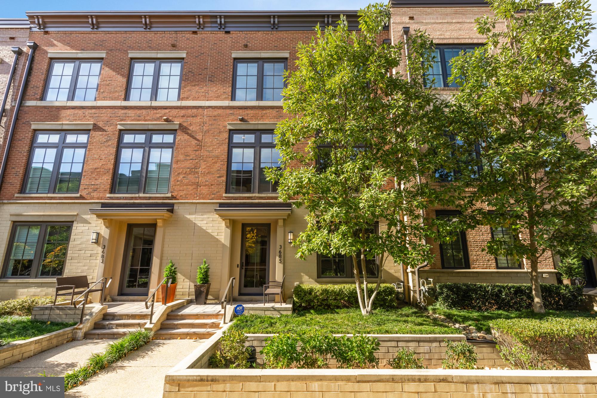 Experience luxury living on a grand scale in this spectacular 4,145-square-foot residence at The Brownstones at Chevy Chase Lake, a private enclave of townhomes set along wooded Chevy Chase Lake Drive. Thoughtfully designed and impeccably finished, this expansive home offers an elevator serving all levels, a two-car garage with EV charger, and an inviting rooftop deck with outdoor kitchen and gas fireplace. With a recently repainted exterior and a low HOA fee covering landscaping and snow removal, this home offers effortless, lock-and-leave living. Beautifully outfitted with extensive custom upgrades by the current owner like motorized shades and custom built ins—details you simply won’t find in new construction—this home delivers refined living just steps from shops, restaurants, the scenic Capital Crescent Trail, and the soon-to-arrive Purple Line.

The entry level features a welcoming foyer with a flexible office or guest suite complete with custom built-ins, wine fridge, and full bath, along with a mudroom, coat storage, and direct access to the two-car garage. The elevator conveniently opens to both the garage and mudroom for effortless daily living.

The main living level is ideal for entertaining, offering a gracious dining area, a living room centered around a gas fireplace, and a sleek chef’s kitchen with Thermador and Bosch appliances, paneled refrigerator and dishwasher, and a large island with seating. A cozy family room, convenient powder room, pantry, and a deck ideal for grilling or morning coffee round out this level.

Upstairs, the primary suite is a serene retreat with a sitting area, two walk-in closets with custom built-ins, and a spa-like bath with dual vanities and glass shower. A second en-suite bedroom and a well-appointed laundry room complete this level.

The top floor offers a light-filled family room that opens to the expansive roof deck—featuring a built-in grill, wet bar, refrigerator, and gas fireplace—perfect for entertaining or unwinding under the stars. A spacious bedroom with a walk-in closet and full bath completes this level.

Chevy Chase Lake puts everyday conveniences just a short stroll from your front door, with neighborhood favorites like Elena James, Ro Sushi Co, Dok Khao, local cafés, fitness studios, Starbucks, CVS, and more. The Capital Crescent Trail—a treasured 11-mile path for biking, walking, and jogging—runs alongside the community and stretches all the way to Georgetown. With downtown Bethesda only 1.5 miles away, quick access to I-495, and the soon-to-arrive Purple Line light rail—engineered for quiet operation with regulated exterior noise limits—this location offers an exceptional blend of luxury, convenience, and community.

Floor plans reflect square footage of 4,145 sf
Square footage is approximate and should not be used for property valuation.