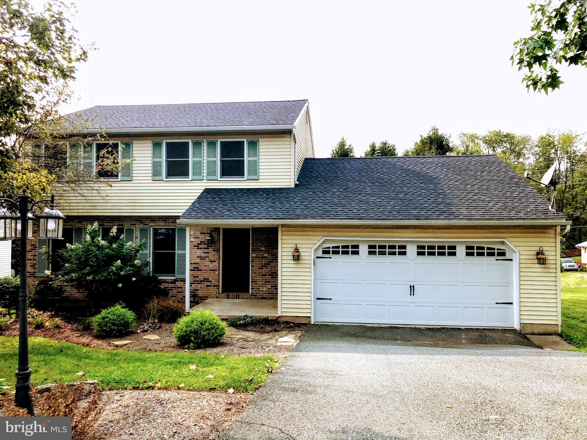 Beautiful 2 Story Home with Hardwood flooring throughout.  The open concept makes for an easy flow from the Kitchen to the Living Room.  Slate flooring in the Kitchen and Half-bath.  Master bedroom complete with walk-in closet and a full bath.  Plus an additional full bath on second floor.  Perfect for entertaining with the finished walk out basement and large rear deck.  Schedule your showing today!  ***Owner is a Licensed Real Estate Agent***