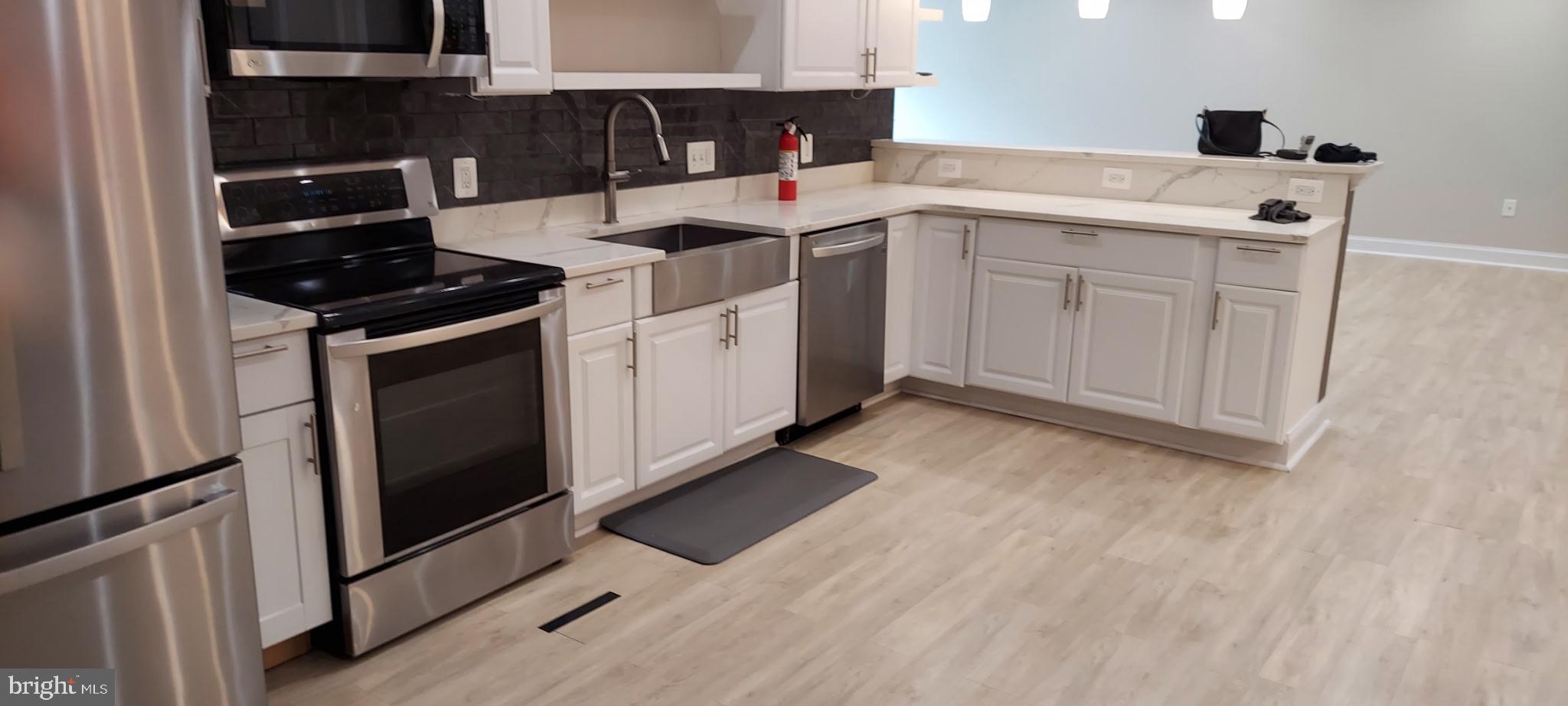 All utilities, plus internet, are included in this completely upgraded, beautiful lower-level,  2-bedroom unit. Private entrance.  Entertain in the lovely, landscaped backyard, which includes a large grill area. Convenient location within minutes of Fort Belvoir, shopping, restaurants, and major roadways