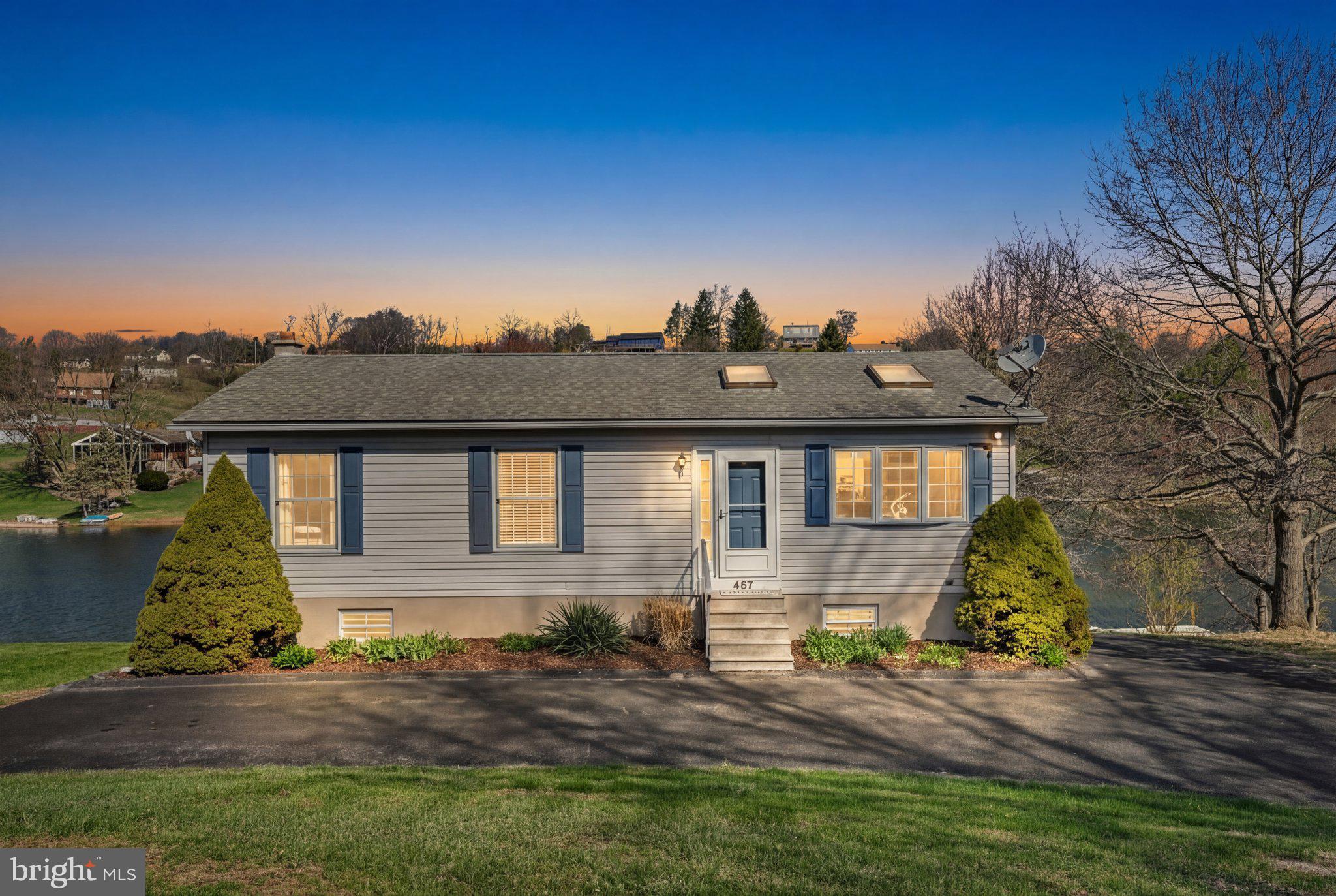 **New Listing — Lakefront Living on Fawn Lake**
Welcome to your dream retreat — a move-in ready, meticulously cared-for 3-bedroom, 2-bathroom 2,050 square foot home nestled on 0.4 acres of pristine lakefront property. Bright, clean, and brimming with character, this gem offers gorgeous sunset views and an easy stroll to the crystal clear waterfront. Step inside to a vaulted living room that creates an airy, open atmosphere, flowing effortlessly into the dining area and well-appointed kitchen — perfect for entertaining or quiet evenings at home.  3 bedrooms and an updated bathroom grace the main floor. The spacious basement is brimming with potential, ready for your personal vision. A family room and an additional bathroom plus laundry area and workshop space accommodate family and guests alike. Notable, functional features include Andersen sliding doors, two mini-split systems for efficient year-round heating and cooling, paved driveway, and on-site septic. Outside, the appeal continues. A large deck with superior views, stamped concrete patio, extensive hardscape with retaining walls, storage under the deck, a shed, and a floating dock enhance this property's outdoor living space. Fawn Lake is a private, 27-acre gem known as the "Little Lake" — specializing in non-motorized and electric-only boating, swimming, and fishing. With 45-foot depths, a dedicated boat launch, pavilion, and serene non-wake atmosphere, tranquility is guaranteed. The dam/spillway was repaired in 2009, and this lake is functioning at full pool. Located within the gated *Lake Wynonah community, residents enjoy 1,476 acres of rolling hills, 27 miles of paved roads, a community pool, lodge, and crystal-clear waters. This is lakefront living at its finest. *Please call the Lake Wynonah Business Office for updates on the "big lake"/Lake Wynonah Dam rehabilitation project and probable future assessment.  Taxes may not reflect 2026 assessed value.