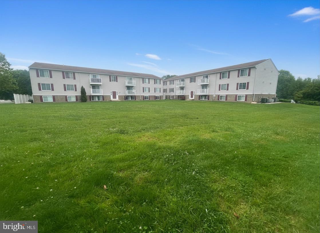Welcome to this beautifully updated ground-floor condo in the highly sought-after Chesterfield community! Offering 2 spacious bedrooms and 1 full bath, this move-in ready home combines comfort, convenience, and value in a desirable location.

Step inside to find brand-new carpet throughout the living areas and bedrooms, complemented by luxury plank vinyl flooring in the foyer, kitchen, and bathroom. The bright, open floor plan is designed for easy everyday living. The updated kitchen features modern finishes, stainless steel appliances, pantry, and a dedicated breakfast area perfect for morning coffee, casual dining, or entertaining guests. The renovated bathroom adds a fresh, contemporary touch, while the LG ventless washer/dryer combo provides added convenience right inside the home.

The spacious primary bedroom features a large walk-in closet, and both bedrooms offer ample storage and natural light. One of this home's standout features is its peaceful setting backing to open community green space, providing a relaxing, park-like backdrop and added privacy rarely found in condo living. Enjoy the ease of ground-floor access with convenient nearby parking and beautifully maintained surroundings.

Residents of Chesterfield enjoy a wide array of community amenities, including swimming pools, basketball and tennis courts, playgrounds, walking paths, and expansive common areas. Conveniently located near shopping, dining, schools, and major commuter routes, this home offers easy access to Baltimore, Annapolis, Fort Meade/NSA, and Washington, D.C.

Whether you're a first-time homebuyer, downsizing, or seeking a low-maintenance lifestyle, this updated condo is ready to welcome you home.