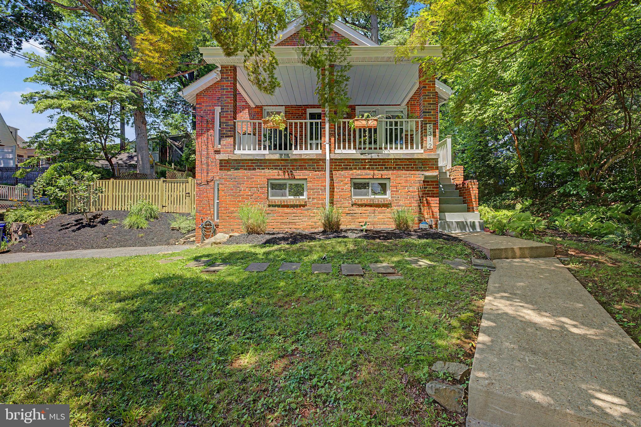 Welcome to this stunning 3-level brick bungalow in the heart of Glen Echo Heights — where timeless charm meets modern sophistication. From the moment you step inside, you'll feel it: this is not just a house, it's a home.
Sunlight cascades through every room, and the main level shines with gorgeous oak hardwood floors, a warm fireplace, and an open, beautifully appointed kitchen with quartz countertops and stainless steel appliances. The kitchen opens effortlessly to an expansive deck and a breathtaking backyard sanctuary — a lush, fenced retreat enveloped by trees and nature, perfect for morning coffee, evening gatherings, or simply unwinding in your own private paradise.
The upper level is a world unto itself — a serene private suite featuring a full bedroom, full bath, dedicated sitting area, and office space that offers the ultimate in comfort and privacy. The main level features two additional bedrooms and a full bath, while the light-filled walkout basement offers a fourth bedroom and a show-stopping spa bathroom complete with a jacuzzi tub, separate shower, and marble tile that evokes a five-star retreat.
And the location? Unmatched. Minutes from the C&O Canal towpath, the Capital Crescent Trail, Glen Echo Park, and a neighborhood pool and playground — with effortless access to downtown Bethesda, D.C., and Northern Virginia via the Red Line Metro, bus, or car. Top it off with coveted Walt Whitman school district zoning, and this home checks every box.