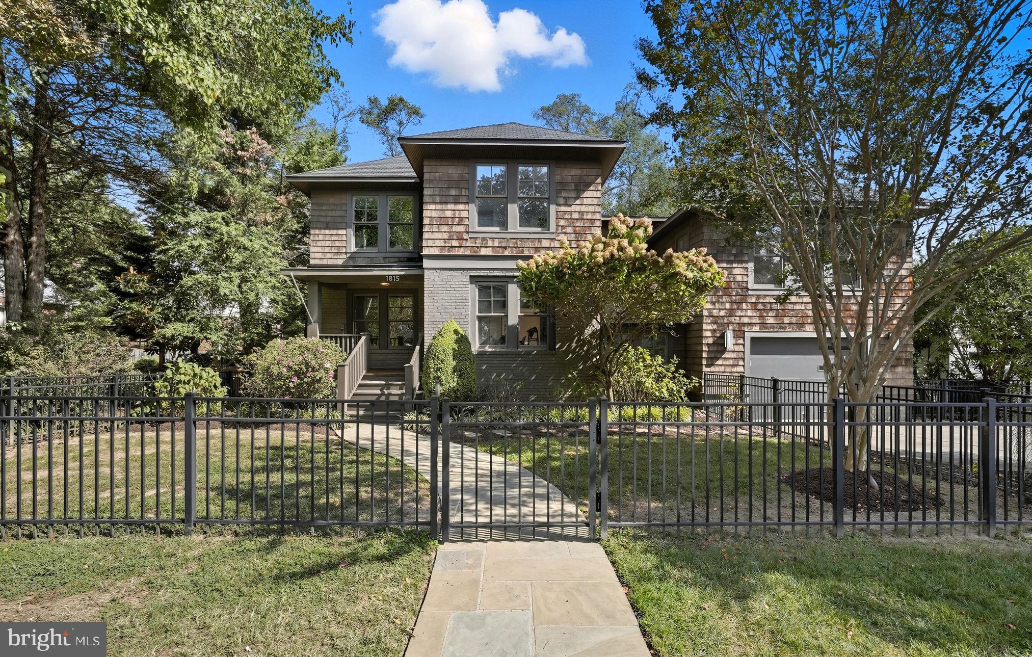Welcome to 1815 North Utah, a stunning cottage-style Craftsman in the heart of Waverly Hills. This combined 3,500 sf, 4 Bedroom, 3.5 Bath gem tucked away in the heart of North Arlington offers up indoor/outdoor living that is hard to find in the area. The extensively hardscaped backyard flows out from a large porch with Mahogany decking. An outdoor grill and kitchen overlook the wood-burning fireplace and entertaining area, while the rest of the oversize yard is hidden from neighboring properties with mature trees and foliage. The property is fully fenced, with a backyard board & batten privacy fence for additional peace and seclusion.  A 2009 renovation and addition by renowned Arlington builders, Mickey Simpson, brought to life the owners' love of the outdoors, gardening, and entertaining family and friends.

Inside the home, an open concept kitchen and living area are brought together by a centerpiece fireplace. Off the main staircase lies the family room with its own private full bath and walk-in closet, lending itself to be used as a 2nd primary bedroom or home office. The upper-level primary bedroom lies on the back of the house looking East over the yard. A whole wing unto itself, the primary has access to the 2nd-level screened porch with a custom outdoor full-size swing bed, the perfect morning coffee spot to soak in the sunrise. The 2 auxiliary bedrooms face West overlooking N Utah St and share a hallway bathroom. The 1-car oversized garage is off the lower-level staircase that leads into the large unfinished basement, perfect for a workshop, mud room, or to finish out for additional living space. 1815 N Utah is a hidden North Arlington gem lovingly brought to life by the sellers and awaiting its new owners with open arms.