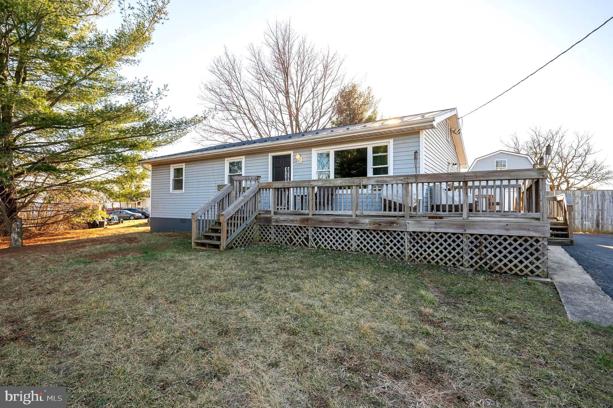 Back on the Market!
This charming rancher does need some work but has loads of potential.  It is ideally located just minutes from Winchester City. Featuring an open floor plan, the eat-in kitchen and granite counter top, with a large pantry.  The kitchen flows seamlessly into the spacious living room. The home boasts three generously sized bedrooms and a well-appointed bathroom, all on one convenient level.  
Situated on a large lot, this property offers a fully fenced backyard, perfect for outdoor activities and relaxation. The roof was replaced in 2017 with a durable metal roof for added peace of mind.
The detached garage presents exciting potential—it’s currently used for storage but could be easily converted into an apartment or in-law suite. It has already been stubbed out for plumbing and electrical, making it ready for your vision.

Don’t miss the chance to make this wonderful property your own!