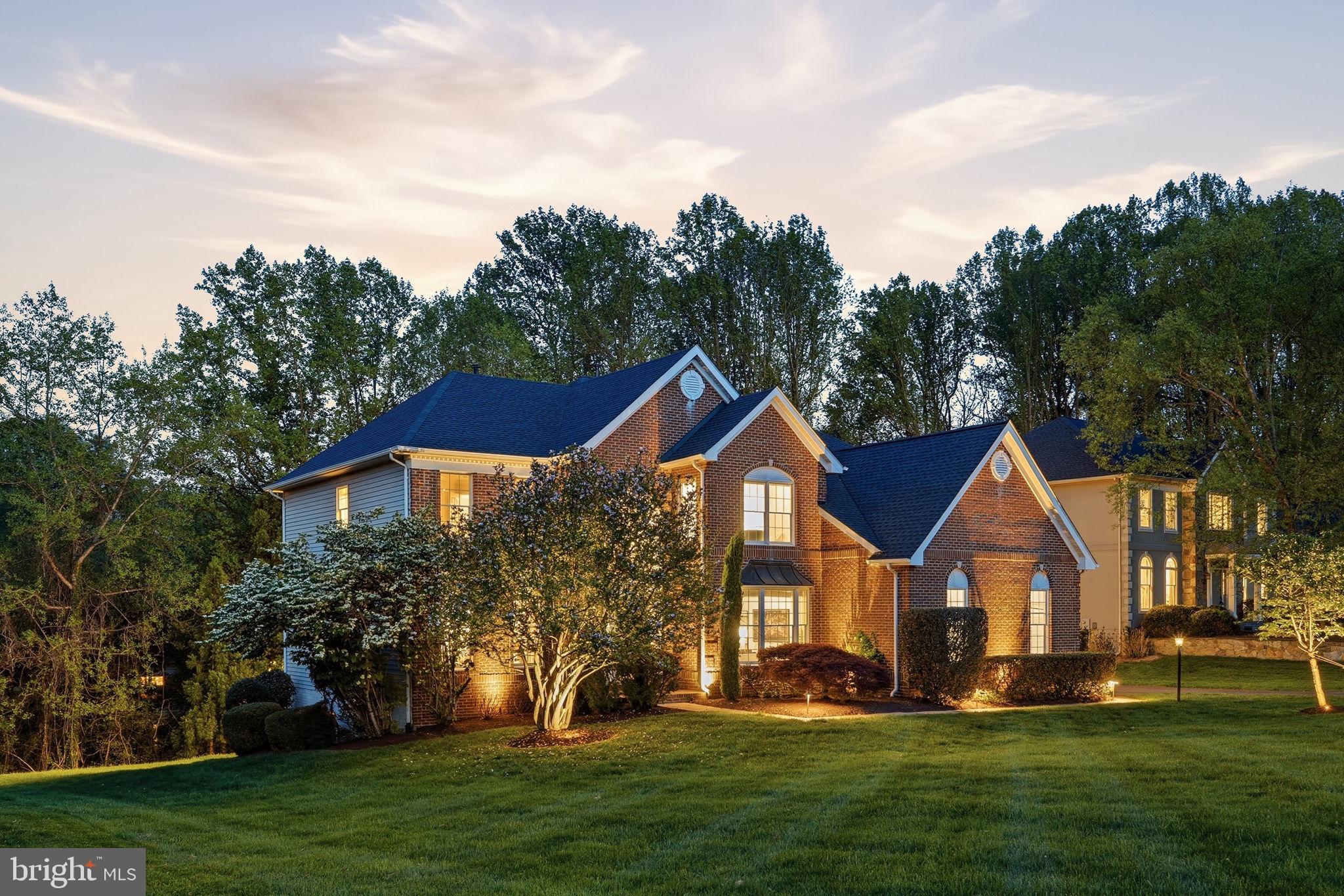 Welcome to 1283 Cobble Pond way, at the end of a cul-de-sac in The Estates at Great Falls Crossing, where this 5-bedroom, 4.5-bath home sits on a private 0.62-acre lot backing to mature trees.

The curb appeal is strong with the all-brick front, massive front yard, and a 3-car side-load garage. The home opens up into a bright 2-story foyer, as the well-designed layout becomes visible from your first steps inside. The kitchen has been updated with recently replaced stainless appliances, granite countertops, and professionally refinished cabinetry. The kitchen flows naturally into the breakfast area and out onto the deck with a gazebo and multiple places to hang out. Back inside is a large two-story family room centered by a fireplace and open to the kitchen for entertaining. Before going upstairs, the main-level also includes an office space with tons of natural light, located next to the half bath.

Upstairs, the master bedroom is positioned for privacy with no shared walls to the other bedrooms. It includes a sitting area, a large walk-in closet, and a well-appointed bathroom with dual vanities, soaking tub, and a separate shower. The second bedroom upstairs has a private en-suite bath. Bedrooms three and 4 are both spacious and are adjoined by a jack-and-jill style bathroom.

The lower level adds a lot of flexibility depending on how you want to use it, with a full bar (including dishwasher and fridge), a rec room that can be used as a gym or home office, an in-law suite bedroom with plenty of sunlight, and walkout access to the patio. Out back, you’ve got multiple options between the deck, patio, and gazebo, all situated at a private, tree-lined yard.

Location-wise, you’re close to Route 7, Tysons, Reston Town Center, and the Silver Line Metro, with community amenities that include a pool, clubhouse, playground, tennis and basketball courts!

Recent updates to major systems and appliances include:
HVAC - 2025
Hot Water Heater - 2024
Kitchen Appliances (Fridge, Dishwasher, Ovens, Gas Cook Top) - 2023
Roof - 2022