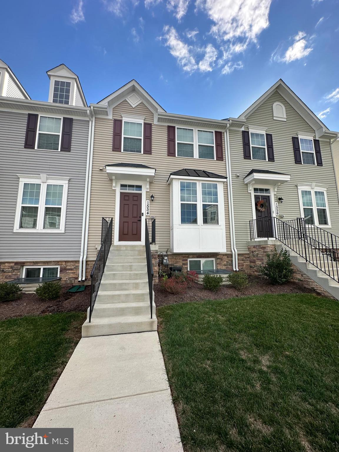 This Lovely almost new  3 level townhome is ready for move in.  Open floor plan with gorgeous gourmet kitchen and a deck off the back. Fully finished basement with 1/2 bath and attached garage.
Primary Bedroom with bath, 2 other bedrooms and laundry on upper floor. Perfect location for commuting, dining, shopping and sight seeing. Don't wait, this one won't last long!