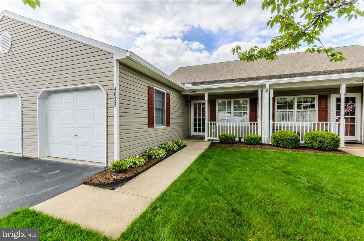 One Floor Living in this Pristine 2 Bedroom Condo! All appliances included - washer/dryer, gas oven/range, refrigerator, microwave & dishwasher.  One car attached garage, patio in the backyard, laundry room, open kitchen, living room/dining room.  New A/C & Furnace 10/2015!  Walking paths, Clubhouse is available for entertaining.