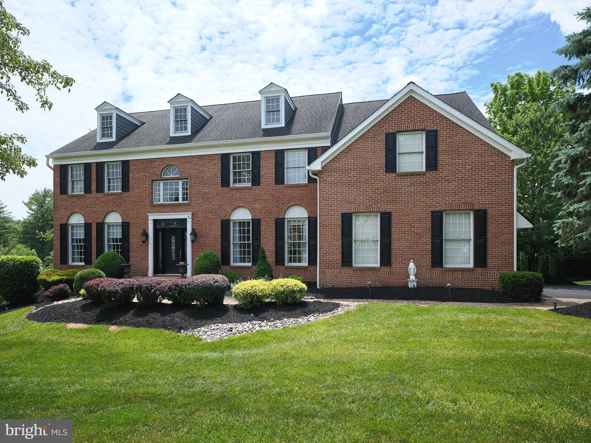 Residing in highly desired Kimbles Field; this idyllic stately home is a lesson in extraordinary living. Nestled within a serene setting and enhanced by natural topography that has been crafted to create exceptional outdoor living space providing entertainment perfection. The park like setting features an in-ground salt water pool, tiered decking, patio, plush lawns and professional landscaping. This meticulously maintained home features an open yet elegant floor-plan graced with gleaming hardwood floors, rich moldings and palladium windows. The grand scale of the two-story foyer is complimented by the distinctive dining room and handsome office/study. An awe-inspiring vaulted great room is the heart of the home featuring a gas fireplace surrounded by a custom hand-carved mantle and floor to ceiling arched windows; open to the gourmet kitchen featuring granite countertops, center island and premium stainless steel appliances. A sliding door off the breakfast room opens to tiered decking with panoramic views of the salt water pool and rear grounds. Unexpected yet completely embraced is the added first level in-law/au-pair suite with spa bath. The second level is equally impressive hosting four generously sized bedrooms and two full bathrooms. Double doors lead to the sizable master suite with sitting room, two walk - in closets and newly renovated spa bath. Magnificent in purpose and size, the bright and airy walk-out lower level is an entertainers delight featuring a wet bar, media room, game area, full bath, ample storage, and a utility/work room; all open to the patio and refreshing in-ground pool. Adding to the allure and ease of ownership of 1051 S. Kimbles Road are the many renovations and upgrades featuring a newer roof, new siding, new garage doors, paver walkway, new front door, seamless gutters, two-tier decking, black aluminum fencing, under deck patio, new hot water heater, newer two zoned heating and air conditioning with humidifiers, master bedroom renovation, all bathrooms renovated, in-law/au-pair suite with full bath addition, new dishwasher, new island microwave, new washer/dryer, gas fireplace insert and a new salt water pool generator. Exceptionally convenient to Yardley, Newtown and New Hope Borough's - home to riverside dining & theatre, strolls on the canal towpath and walk/runs in Tyler State Park. Philadelphia, Princeton and NYC are also just a short commute away.
