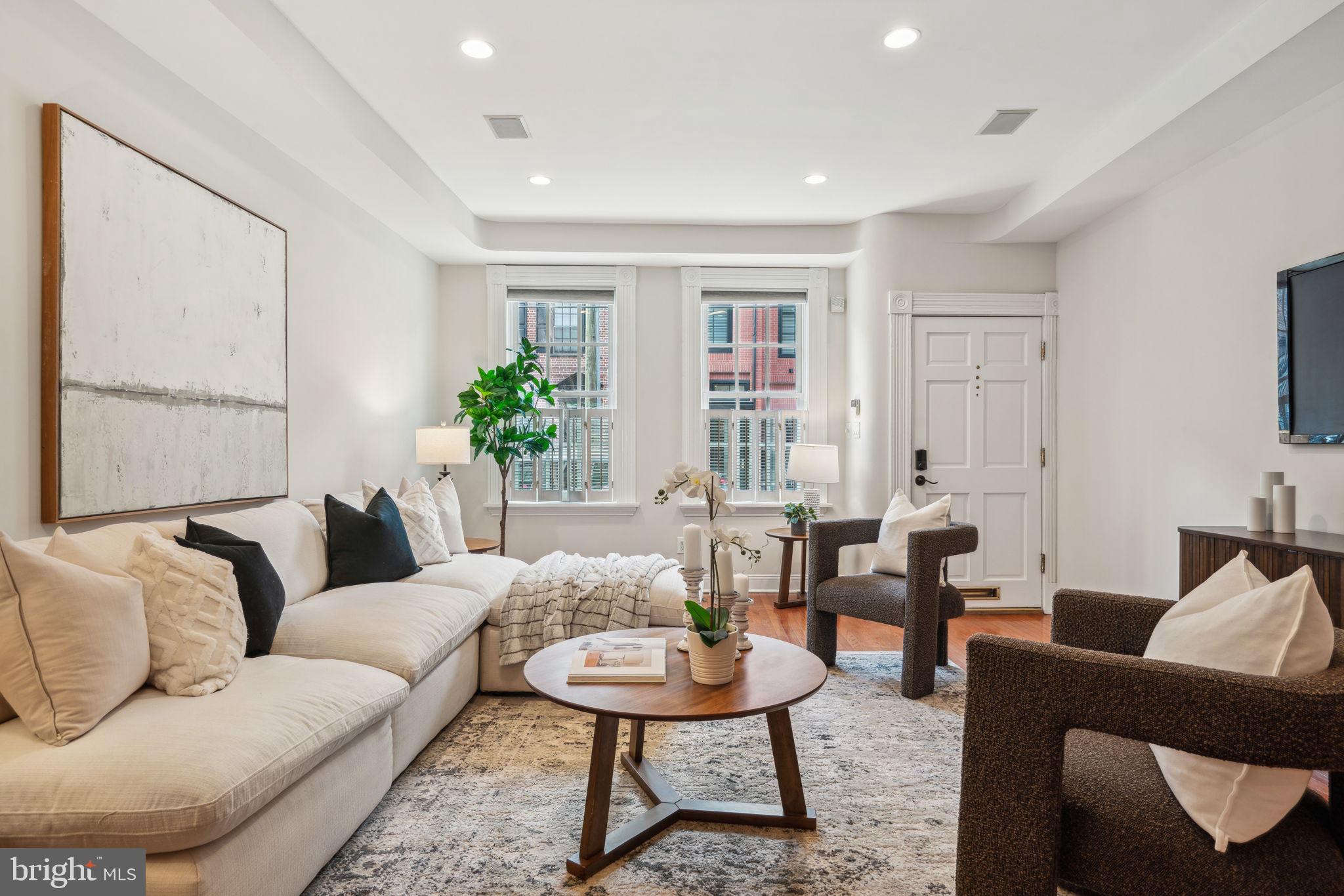 Historic Charm Meets Modern Living in the Heart of Queen Village... Welcome to 723 S. 2nd Street — a rare opportunity to own a historical stately home in the heart of Queen Village. Streets. This 5-bedroom, 3.5-bathroom home in one of Philadelphia’s most sought-after neighborhoods. Nestled on the corner of 2nd and Monroe Streets and located in the desirable Meredith School Catchment, this spacious property offers the perfect blend of historic elegance and modern convenience.
Step inside to an open and airy living and dining area, ideal for entertaining or cozy nights in. You'll be captivated by six original fireplaces throughout the home, adding warmth and character to each level. The kitchen is well-appointed and seamlessly connects to one of the home’s four private outdoor spaces, perfect for al fresco dining, morning coffee, or simply unwinding. Just off the kitchen, a butler’s pantry with a wet bar and wine fridge adds style and function — perfect for hosting or keeping everyday essentials tucked away.
With five generously sized bedrooms, including a full-floor primary suite, there’s room for everyone — whether you need extra space for a home office, guest room, or growing family. A convenient upper floor laundry area makes everyday living that much easier. Hardwood floors flow throughout the home, tying each space together with warmth and continuity. The spacious, unfinished basement offers excellent storage potential and room for future customization. Enjoy multiple balconies, a rear patio, and a rooftop deck with both city and waterfront views — rare finds in the city that truly elevate your living experience.
Located just steps from neighborhood favorites like Head House Square, South Street, and the Delaware River waterfront, this home places you in the center of Queen Village’s vibrant dining, shopping, and community scene. Easy access to public transportation and major highways adds convenience to this charming address.  Owner is also offering credit towards 1 year of prepaid parking in nearby garage. 
Don’t miss your chance to call this distinctive and spacious Queen Village residence home!