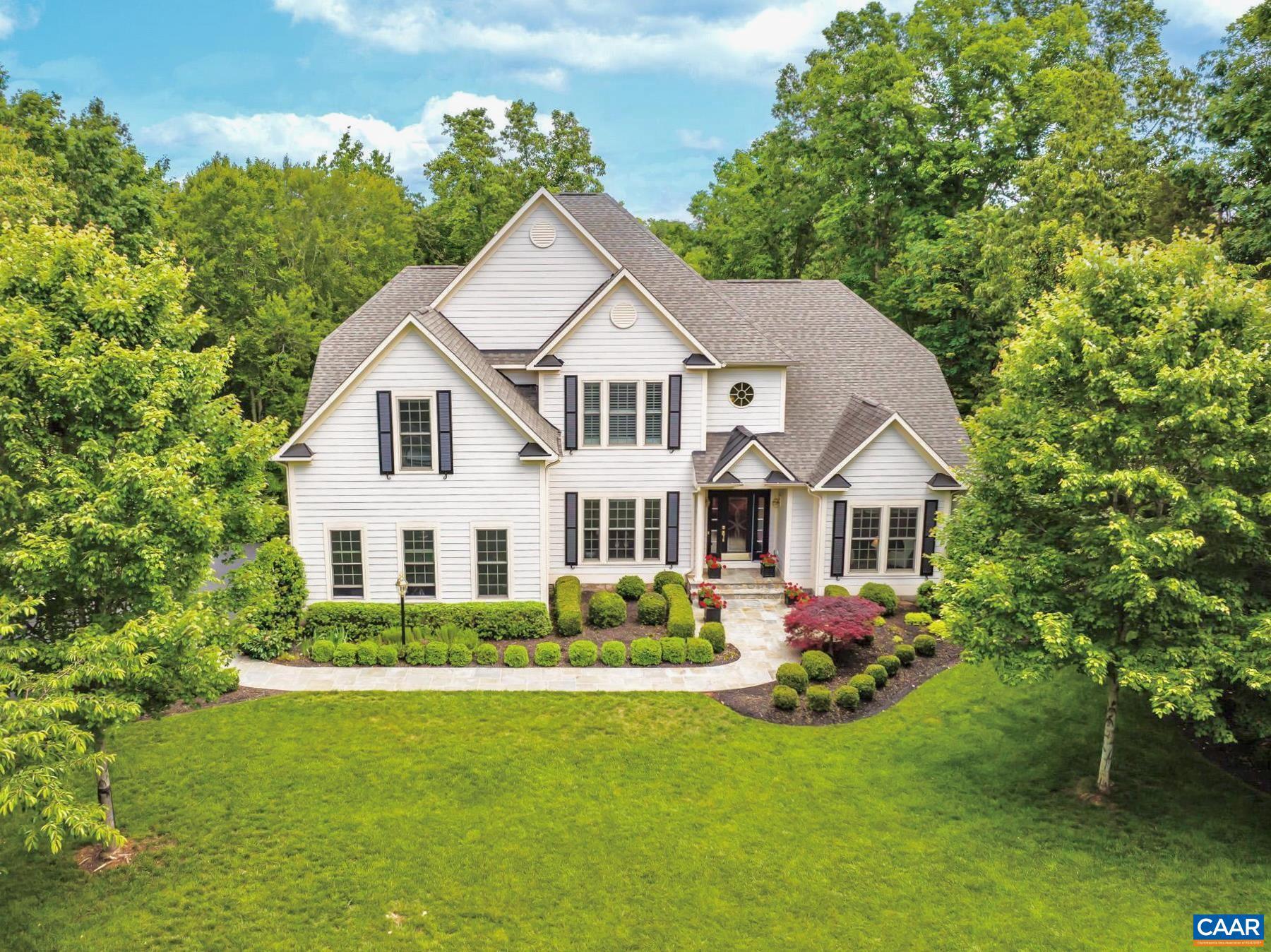 Open House May 3rd, Sunday 2-4. Nestled within the prestigious gated community of Glenmore, this flawlessly maintained estate offers the pinnacle of golf course living. A striking blue stone walkway leads into an expansive open floor plan defined by extensive millwork and a breathtaking great room featuring 20-foot coffered ceilings and a cozy fireplace. Perfectly designed for one-level living, the primary suite and a dedicated home office with custom built-in bookshelves are located on the main level, while a second level has 3 additional bedrooms, 2 baths & private office. The oversized kitchen is a chef?s delight, anchored by a massive island and an electric cooktop for easy cleanup. The finished terrace level serves as an entertainer?s sanctuary, boasting a family room with the home?s second fireplace, a full guest suite, an extensive wet bar, and a wine cooler. Outside, the rear blue stone patio provides a serene setting backing to the beautiful golf course. With a 3-car garage, ample storage, and dedicated space for a future home theater, this home seamlessly blends luxury and functionality.,Cherry Cabinets,Granite Counter,Fireplace in Family Room