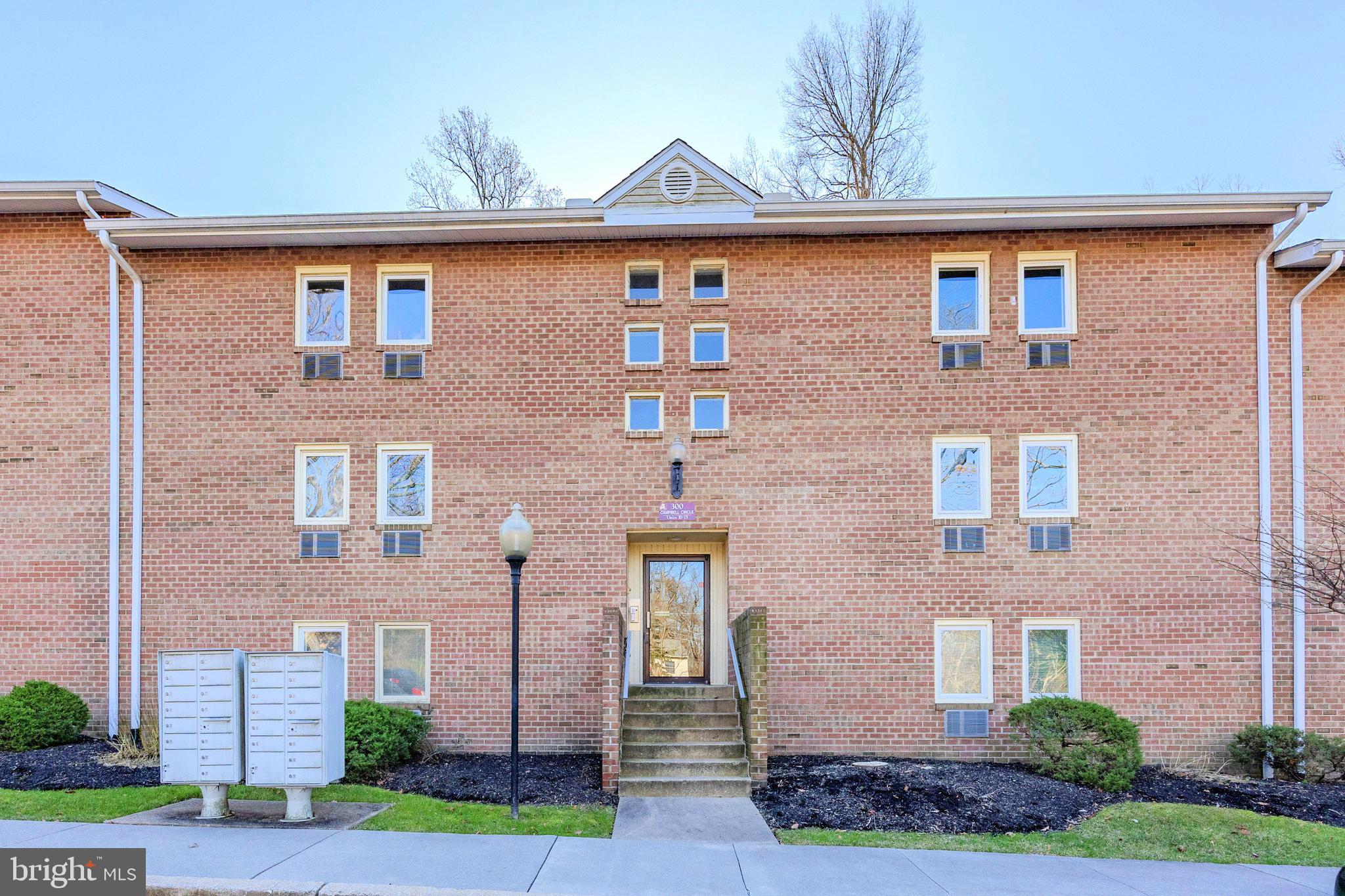 With a balcony overlooking the beautiful open space & woods, plus an updated Kitchen with new white cabinets, plus an open lay-out replete with natural sunlight --- this condo will delight you at every turn! In the award-winning Downingtown East Schools and close to popular shopping centers, parks, dining, trains, Rtes 30/113/100/202 & everywhere you want to be! Into the modern Kitchen which includes a sit-up peninsula; stylish raised-panel cabinets including pantry cabinets for your organized storage; stainless steel sink & faucet; and new fridge (2021). The huge Dining Room has a sun-filled window overlooking the bucolic woods! You will love the spacious Living Room which also includes a ceiling fan and slider doors out to the sizeable Balcony. There are 2 oversized Bedrooms both with ceiling fans and ample closets, and one is en-suite with its own Full Bath w/stall shower. And do not miss: the second Full Bath with a tub/shower combo; coat closet; large walk-in hall closet; and a laundry area with new stackable washer/dryer (2022). There is a new roof (2021); new hot water heater (2022); and 3 built-in AC wall units. And WOW! --- even more storage in the secure storage room out in the landing foyer. And plenty of paved parking. Practically carefree living as the condo fee covers the community pool, playground, exterior building maintenance, lawn care, snow removal, trash/recycling, water, and sewer. Our teams of professionals have JUST completed a full home clean/fresh paint throughout entire condo/carpets deep steamed cleaned --- move in today! Some photos virtually staged.