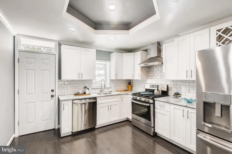 ***Enjoy this fantastic home at an even better price! *** 
Discover the perfect blend of comfort and convenience in this beautifully remodeled home, designed for effortless living. Step inside to an inviting open floor plan that boasts ample space for relaxation and entertainment. The 2nd level features two generously sized bedrooms and a stylishly updated bathroom, offering a serene retreat.
The fully finished lower level provides incredible versatility, complete with a private bedroom, a modern bathroom, and a well-equipped kitchenette featuring a stovetop, countertop, refrigerator, washer, and dryer—ideal for guest or in-laws.
Situated in a prime location, this home offers easy access to shopping, dining, parks, and major commuter routes, including I-95, Route 895, and Route 695. Plus, it's just minutes from Bayview Hospital, making everyday conveniences right at your doorstep. Don't miss this exceptional opportunity!