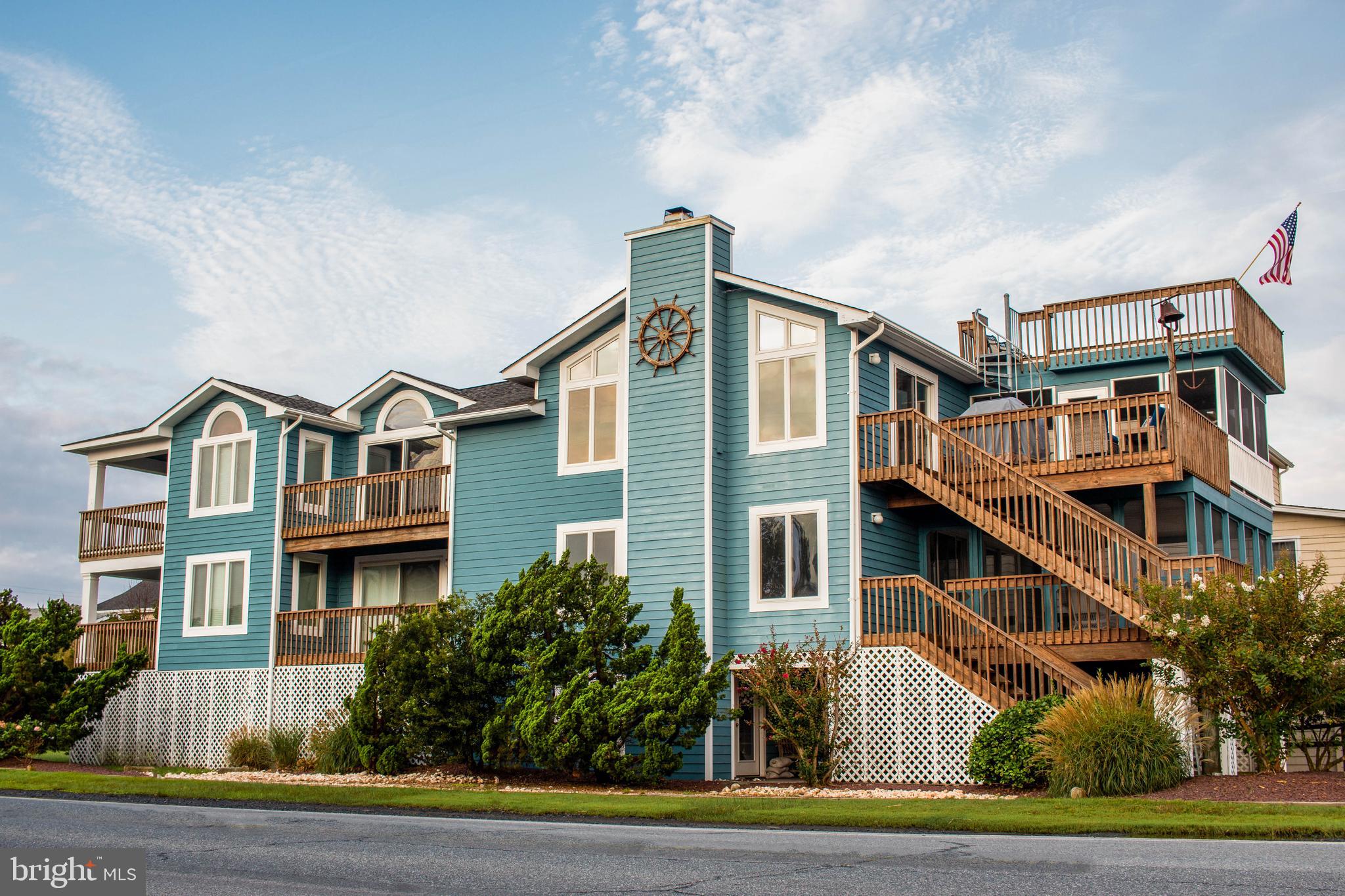 Decisions, Decisions......  Sleep in and listen to the sounds of the Atlantic Ocean from one of 2 Primary Suites or view the sunrise from the roof top terrace.... You could also start your day with a short walk to the beach, relaxing in the sauna or reading a book with morning coffee from your choice of 4 balconies, 3 decks, a screened porch or 3 season room. This custom built 3 level coastal home has countless features and endless possibilities, situated on a corner lot only 900 feet to the beach with 5 bedrooms, 4 full baths, and 2 half baths, there is ample room for a large family or plenty of guests. The elevator and wide doors and hallways allow easy access to all 3 levels of the home.  Originally built in 1991 with a major renovation/addition completed in 2007, this home has never been rented and is very well maintained.  Call to schedule your private showing today.