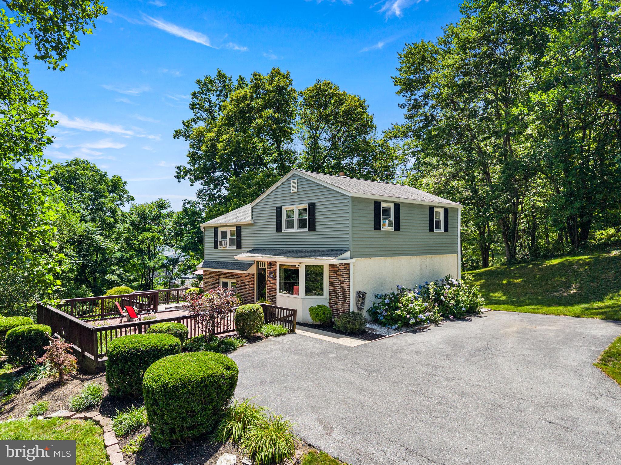 A Wonderful Opportunity to purchase a beautiful home situated on a picturesque 1 Acre Lot in West Chester!   This home is situated high on the property with wooded tree line views from every window... offering complete privacy and tranquility! Located in the Community of Sunset Grove and sits on a quiet No Thru Way street ! This 4Bed/1.1 Bath Split Colonial just had New Vinyl Siding, Flashing and Wide Gutters installed! Up the drive you are greeted by a large brick patio overlooking the expansive front yard.  Thru the Entry to the sundrenched Living Rm, Gleaming Hardwood. Large Bay Window, Recessed Lights and Crown Moldings. open to the Large Eat in Kitchen with Crown Molding, Tile Floor, Maple Cabinets, Corian Tops and Stainless Appliances!  Open to the Breakfast/Dining Area offset by Hardwood. Up a few steps to the second level Featuring a Large  Bedroom w hardwood and good closet space .and a second Bedroom/ Office which all share the Tiled Full Hall Bath on this level.  Up a Few more steps to the 3rd level Featuring the Primary Bedroom w Hardwood, Recessed lighting, Walk in Closet, Crown Molding and a Door to access abundant attic storage!  The final 4th Bedroom completes this level also boasting Hardwood , Recessed and Crown moldings. The lower level features a large Family Rm w/ Recessed Lights,  LVP Flooring, Crown Molding and French Doors to a Large Private Oversized Deck with amazing views!  A door leads to a separate mudroom with Laundry Closet, Storage, an updated Powder Rm and a door exiting to the backyard. The backyard also contains a very Large Barn/Shed with electric and a double door drive in access for tractors etc and an abundance of storage. In addition to the New Siding and Gutters, The Boiler was replaced in 2015 along with the Well Tank. This interior of this home has been painted in an attractive calming color palette. Extensive Landscaping with multiple Outdoor entertaining areas, from the large brick front patio to the huge side deck to take in all the views.  If you want acreage with Privacy yet convenient to all major commuting routes, Trains , Shopping , Restaurants and all that West Chester Boro and Exton Have to offer.... Then 525 Oriole Dr is your Next Home!  Welcome !