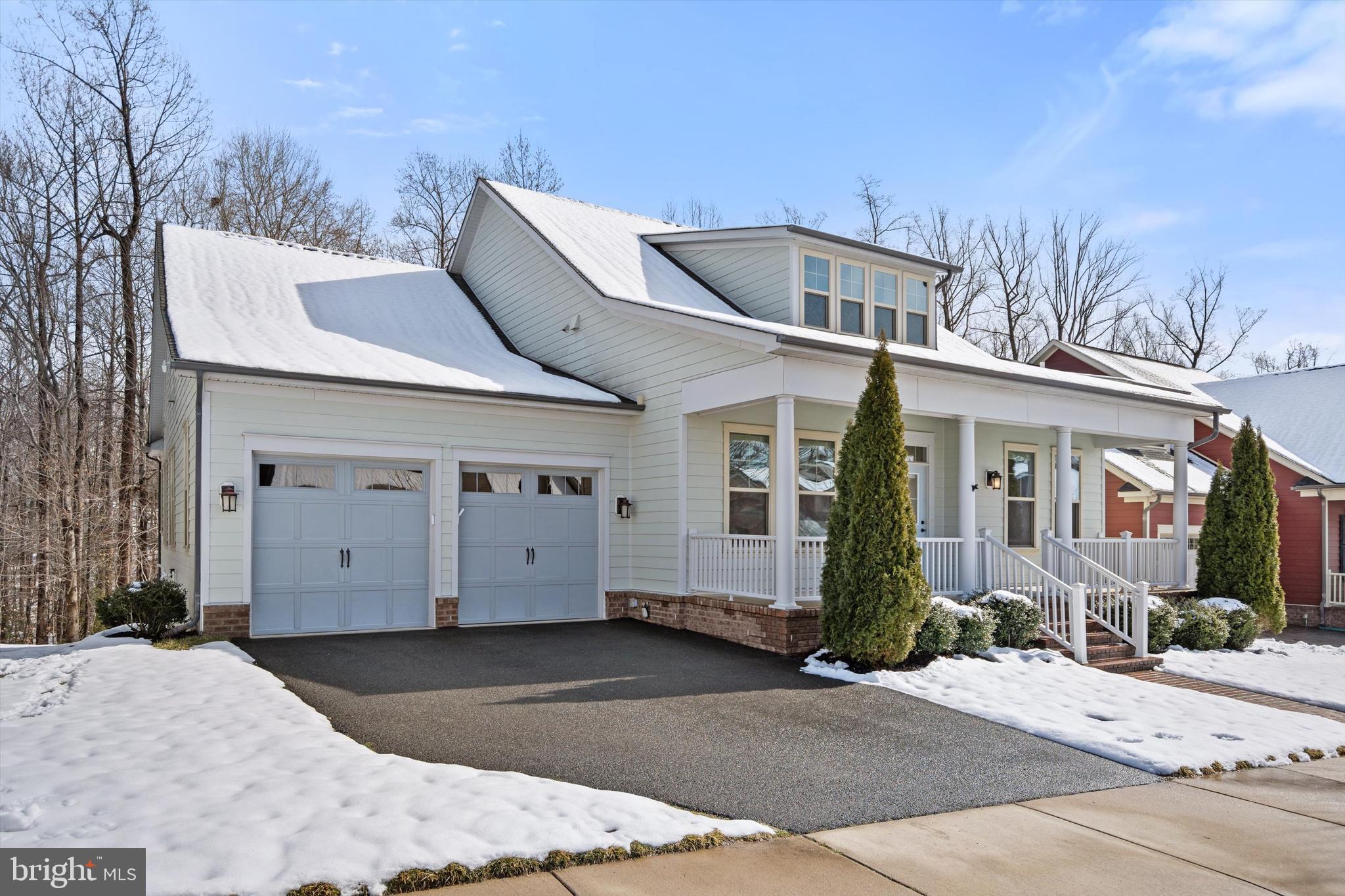 Coastal breezy style in this dream home in Potomac Shores!!

This stunning home features a main-level living floorplan in the established section of Potomac Shores.  There are three bedrooms and two and a half baths on the main floor, a designated office, formal dining room, a huge kitchen, breakfast room, coffered ceiling family room, screened rear porch as well as a walk-in laundry room and two car garage. Note: the owner's suite has a luxury bath with a soaking tub, shower, and dual vanities and there is a large walk-in closet. That bedroom is at the rear of the home. This is an easy home to live in. Downstairs you will find a finished walk-up basement with a rec room, bedroom, full bath, and two storage rooms. So in total, the home has approximately 4900 square feet of which 3900 is finished living space. The ceilings are ten for high on both levels, there is a lot of natural light, a white-on-white kitchen with stainless appliances, hardwood floors on most of the main floor living space, and an elegant coffered ceiling in the family room. Step outside and find yourself on a covered porch overlooking your wooded lot – perfect for relaxing evenings or entertaining friends! The home was built with energy-efficient features like warm gas heat & hot water systems, an interior sprinkler system & fresh air recovery fan. Enjoy the benefits of low e-lite windows, James Hardi Siding, and a whole house security system. The monthly HOA fee of $180 includes the 150/150 Internet, access to the Gym, snow removal, trash pickup, and 5 miles of nature trails plus all the social activities. This is truly a rare find. Main-level living is a gift you give yourself ( or your knees!) Seriously it is a great floor plan. Even better, Potomac Shores is a Resort-style living community. So it is active with meet-ups, social activities, and clubs such as Beer & Wine, Book Clubs, Bunco, The Caskers Club, The Cigar Society Meet-ups, Car Club, and so many more. The Social Community does a fantastic job hosting resident events for holidays. There will be a future day-to-night town center and the Potomac Shores VRE Station. Reach out if you have any questions .. Don't miss out on this fantastic opportunity! Thank you for showing.
