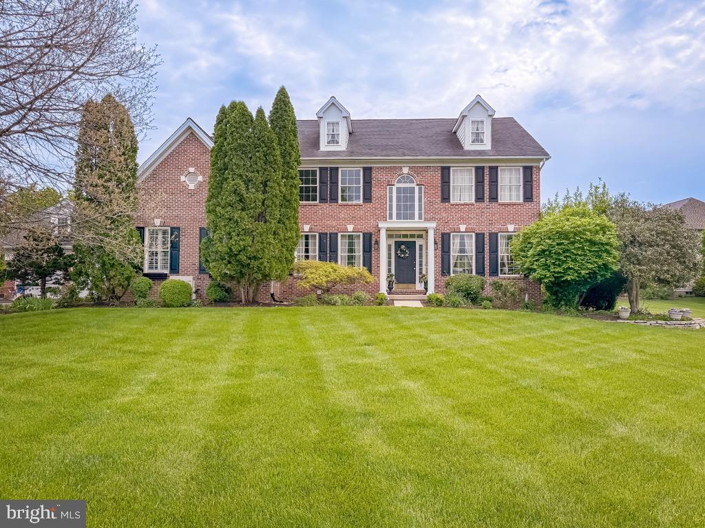 Welcome to 318 Wild Prairie Court in the highly desirable Chestnut Creek subdivision!  A well-maintained PAONE-built Federal Style Colonial Home located on a private cul-de-sac with a large lot over half an acre.  You will find plenty of space and thoughtful updates that elevate everyday living and entertaining for a large family, inside and outside, including the addition of an in-law suite and two-car detached garage with bonus loft. This home offers classic architecture, including random-width Brazilian Cherry floors throughout the first floor and master suite.   A dramatic two-story foyer sets the tone as you enter and accentuates the open floor plan and room to room flow.  The first floor features a dramatic two-story family room with a custom American Cherry mantel and four large double-pane windows that fill the space with natural light.  The deep finish of mahogany and cherry set warm tones throughout the first floor living space.  Formal Living and Dining Rooms showcase timeless details including open entry ways, natural light, and large picture windows making them ideal for holiday entertaining. A private Office with French doors provides a dedicated work-from-home space. The large Kitchen has been updated with stainless steel appliances and includes a breakfast area with glass doors to the large rear patio and yard.  The large in-law suite features a separate entry way, side foyer, large bedroom, and full bath.  The addition blends seamlessly with the original home and provides a private space for guests or special care of a loved one. Upstairs, the Primary Suite offers Brazilian Cherry flooring, generous closet space including a walk-in, and large Primary Bathroom with shower and tub. Three additional large Bedrooms share a full Hall Bath. There is attic access and is partially floored. The professionally finished lower level features a large Philippine Mahogany bar and wainscoting throughout that is ideal for entertaining. The exterior improvements enhance curb appeal and function, including well-manicured beds, three-season flowering shrubs, mature oaks in front, dogwoods, crape myrtles and a large weeping willow in the rear, and a large, private brick patio to enjoy outdoor living. Ideally located near Route 309, the PA Turnpike, and SEPTA rail, with easy access to shopping, dining, and Ambler Borough. Just a five-minute walk from open green space at Whitemarsh Memorial Park and within the Hatboro-Horsham School District. Call for your showing TODAY! Property returns to Active as of the Open House on Sunday, June 14, from 12 to 3