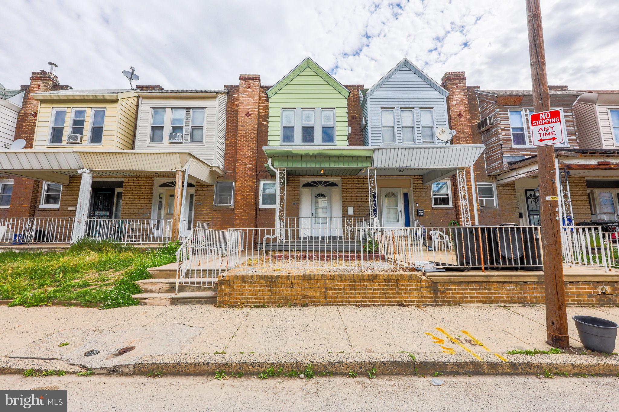 Move-in ready. Four bedrooms, one bath, straight-thru layout, over 1,000 square feet of real livable space with additional room in the basement. This is the kind of home first-time buyers in Philly dream about finding and rarely do at this price point.
The hardwood floors throughout the main level are genuine, not a flip special. Fresh laminate in the kitchen, built-in microwave, range, and refrigerator already in place. You are not starting from scratch, you are starting from comfortable. The living room fits your sectional. The dining room fits your family. Three bedrooms upstairs with natural light and actual square footage, not closets with windows. One clean, updated bathroom. The fourth bedroom is located in the basement, giving you real flexibility whether that is a guest room, home office, or private space for someone who needs their own level.
That front porch is the bonus most people overlook. In Philly, a front porch is where community happens. Summer evenings, neighbors, kids outside. This home puts you right in the middle of that energy.
Oxford Circle is a real neighborhood built for community. Roosevelt Blvd is minutes away, connecting you to the entire city in every direction. Two major shopping plazas nearby mean groceries, pharmacies, restaurants, and retail are never far. SEPTA access through this corridor is consistent, so commuting without a car is completely doable.
This will not last. Call today and lock in your showing.