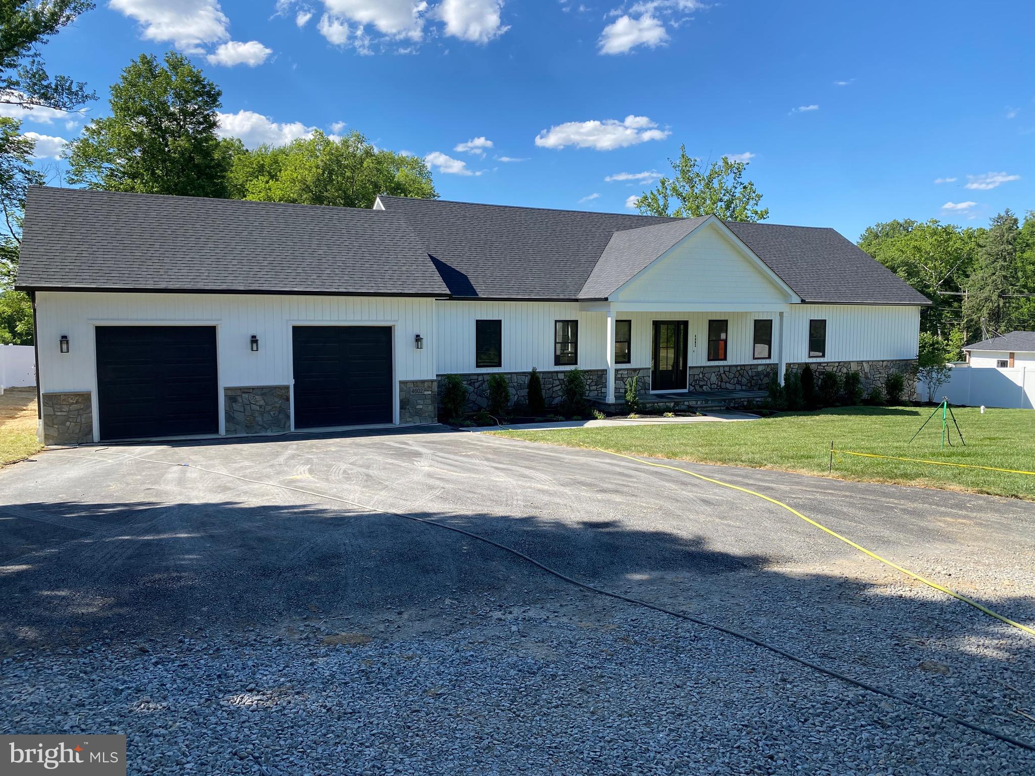Coming Soon 4602 Urbana Pike! If you’ve been waiting for something truly special, this is it. This 2026 custom-built home is packed with high-end finishes, quality craftsmanship, and thoughtful details throughout. Every inch was designed with both luxury and functionality in mind, making it a standout from the typical new construction. Built with quality and designed for the way people live today, you’ll notice the attention to detail and custom touches in every corner.
Designed for sought-after main-level living, this home features two spacious primary suites, each with its own beautifully appointed en-suite bath and generous walk-in closet, offering remarkable comfort and flexibility. The heart of the home is the stunning open-concept living space showcasing rich hardwood flooring, abundant natural light through sleek double-hung windows, designer lighting and switches throughout, and a seamless flow perfect for everyday living and entertaining. The chef-inspired kitchen boasts custom cabinetry, quartz countertops, a massive center island, stylish stainless steel appliances, and  windows overlooking the private backyard. The spacious dining area and expansive family room are complemented by an additional conversation space  making every square foot both functional and inviting.
Need a quiet place to work? The elegant office/study with double French doors provides the perfect private retreat.
The finished lower level offers incredible versatility with an expansive recreation area ideal for a home theater, game room, fitness studio, or entertaining space. A separate flex room and full bath provide endless possibilities for a home office, hobby room, guest retreat, or creative space to fit your lifestyle. Walk-up stairs offer direct access to the backyard for added convenience.
The builder spared no expense, delivering premium finishes and attention to detail throughout. Additional highlights include a brand-new septic system, radon mitigation system, oversized heated two-car garage, EV charger, professionally installed vinyl privacy fence, rear patio, welcoming front porch,  and completed professional front landscaping. Everything is ready for you to move in and enjoy.

Perfectly situated and just minutes from Aldi, Costco, Home Depot, Lowe’s, TJ Maxx, Frederick shopping and dining, FSK Mall. Parks and Urbana amenities in the opposite direction from Frederick Shopping. This exceptional home offers the perfect blend of luxury, convenience, and modern living.

This is more than a new construction home. It’s a custom lifestyle experience that’s increasingly hard to find. Move in, settle back, and enjoy your this summer and all the changing seasons in style.