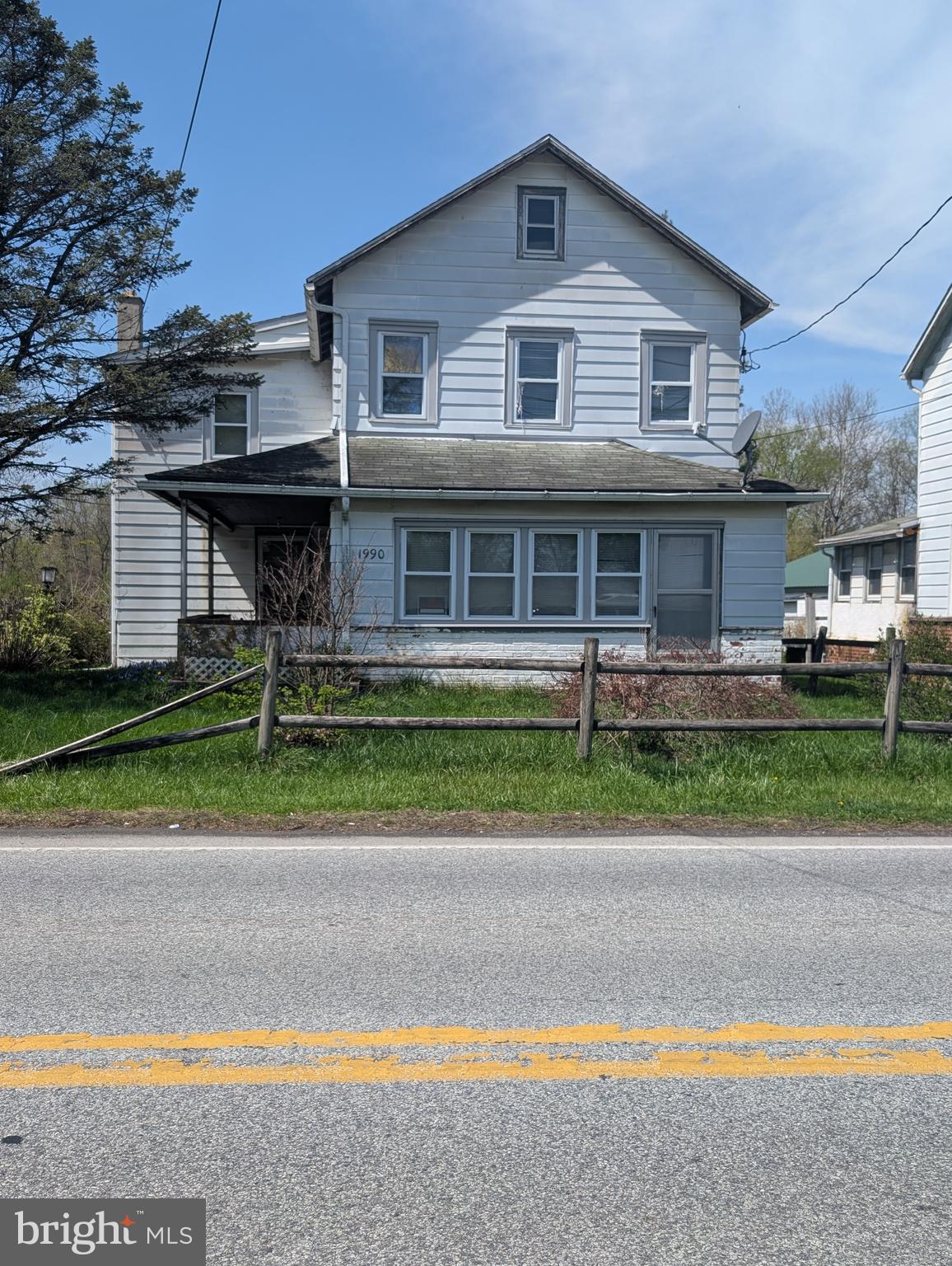 Investor Alert!!! This  property is being offered a live on site Public Auction on Wednesday, June 17, 2026 at 1pm.  This listed price is not the sale price and property may sell for higher or lower than this list priced at public auction subject to seller confirmation of price.  Auction Terms:  10% down payment day of auction, balance of purchase price by July 30, 2026, Buyer pays all realty transfer taxes, property taxes prorated at settlement, property sold in "as is" condition.   Property consists of a 2 story home that needs some updating with a detached 25'x28' garage with a 2nd floor 2 bedroom apartment on a .28 acre +/- level lot.  The house contains 4 bedrooms, living room, dining room large kitchen w/laundry hookups, and a full bath.  The is well water and public sewer.  This property is being sold at the same time at 1988 Valley Road that is next door.  This property is seriously for sale - Don't miss it!!