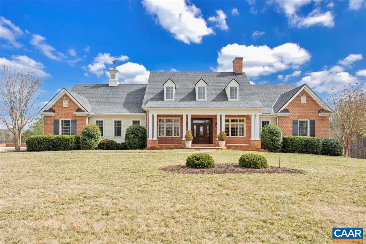 Exceptional brickwork and craftsmanship throughout this custom home set on 20 private acres- peaceful, secluded, and surrounded by nature - no neighbors in sight! This beautifully designed one-level home offers 4 spacious bedrooms, a dedicated office, formal dining room, eat-in kitchen, laundry room, and an inviting great room with gas logs fireplace and built-ins. The generous primary suite features dual bathrooms for added comfort. A full basement includes a half bath (prepped to be a full) and a partially finished terrace-level family room. Outdoor living shines with a screened rear porch, expansive deck, and covered lower-level patio. Attached side-load 2-car garage plus a detached barn/garage with its own gated driveway ideal for storage or hobbies. Horse enthusiasts- bring your vision and create the equestrian setup of your dreams! The property borders a scenic creek, adding to its charm and natural beauty.,Wood Cabinets,Fireplace in Great Room