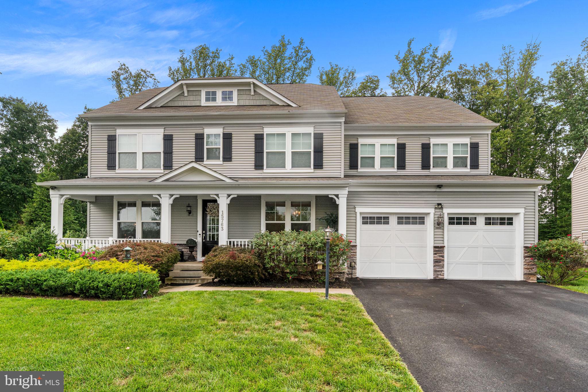Location, location, location! Nestled in one of the most sought-after neighborhoods in Haymarket, this exceptional home offers the perfect blend of convenience and charm. Enjoy the advantage of being within walking distance to the school, along with a beautifully upgraded primary bathroom and inviting living spaces. This is more than a house—it is a rare opportunity to own a true gem in a prime location. 

Welcome to this stunning modern farmhouse-style home at 15763 Audubon Way, Haymarket, VA 20169, offering thoughtful design, expansive living spaces, and exceptional comfort throughout. The main level is designed for both everyday living and entertaining, featuring a spacious family room that seamlessly flows into the breakfast area and gourmet kitchen complete with a large center island, abundant cabinetry, walk-in pantry, and premium appliance layout. The open-concept design creates an airy feel filled with natural light, while the morning room and covered porch provide additional gathering and entertaining space overlooking the backyard. A formal foyer entry is complemented by a versatile flex room and private study, ideal for a home office, library, or playroom. The main level also includes a convenient mudroom entry from the attached 2-car garage, powder room, and guest suite with full bath, offering excellent flexibility for multigenerational living or visiting guests.

Upstairs, the spacious owner’s suite serves as a luxurious retreat featuring a large sitting room, oversized walk-in closets, and a spa-inspired bath with dual vanities, soaking tub, walk-in shower, and private water closet. Three additional generously sized bedrooms provide comfortable accommodations with ample closet space and convenient access to secondary bathrooms. The upper-level laundry room adds everyday convenience, while the open hallway layout enhances the home’s bright and functional design.

The third-level loft provides exceptional flexibility with additional recreation space, a private bedroom or home office, walk-in closet, and full bathroom—perfect for guests, extended family, or a secluded work-from-home retreat.

The walk-out lower level is designed for entertaining and everyday functionality, featuring a spacious recreation room with wet bar, a media room, full bathroom, finished storage area, additional den, and a dedicated mechanical room offering even more storage space. With direct outdoor access, the lower level creates the perfect extension of the home’s living and entertaining areas.

Ideally located in the sought-after Haymarket area, this home offers convenient access to shopping, dining, wineries, breweries, golf courses, and outdoor recreation. Enjoy close proximity to Virginia Gateway, Gainesville shopping and dining, Wegmans, Target, and local favorites throughout Haymarket and Gainesville. Commuters will appreciate quick access to I-66, Route 15, Route 29, and nearby commuter lots, providing convenient connectivity.