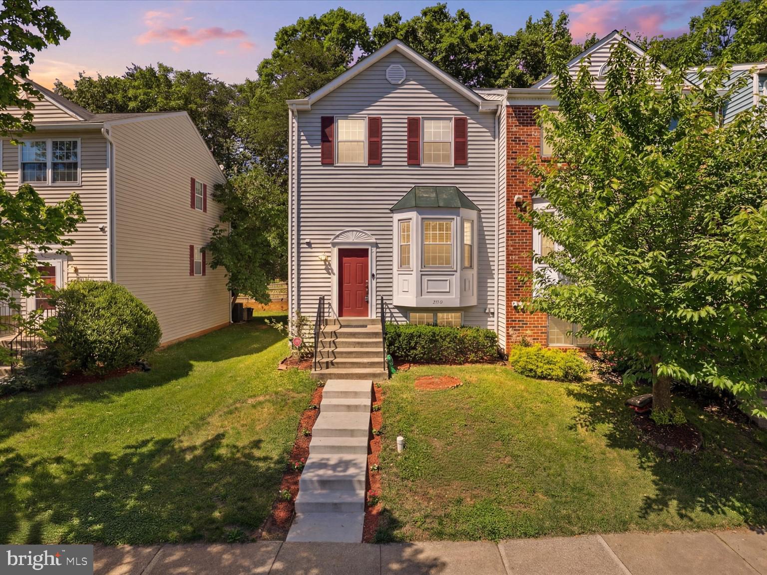 Welcome to 7718 Ora Ct — a beautifully updated 4-bedroom, 3.5-bath end-unit townhome tucked away against a peaceful backdrop of mature trees in the sought after Windsor Green community. Freshly painted and offering over 2,200 square feet of living space with thoughtful updates throughout, this spacious home combines comfort, functionality and privacy in an ideal location.  **** 
Step inside to find a charming bay window in the living room, an open concept dining area, powder room and a large updated eat-in kitchen featuring stainless steel appliances and new cabinet space. Just off the kitchen, enjoy your private balcony overlooking mature trees — perfect for morning coffee or relaxing evenings outdoors.  **** 
Upstairs, the spacious primary bedroom offers an en suite bath and generous closet space, while two additional well-sized bedrooms and a full hall bath provide flexibility for family, guests, or a home office. **** 
The finished walk-up basement expands your living space with a recreation room featuring a cozy fireplace, plus a full bedroom and full bath — ideal for guests, multigenerational living, a gym, playroom, or media space. And the laundry and utility rooms provide additional storage space. **** 
Other benefits include a new Washer and Dryer, new sump pump, assigned parking and ample visitor parking. Community amenities include a pool, tennis courts, playgrounds and walking trails.
Conveniently located near the Greenbelt Metro, NASA, shopping, parks, recreation centers, dining, schools and major commuter routes including I-95, 295, and the Beltway, this home offers the perfect blend of tranquility and accessibility.