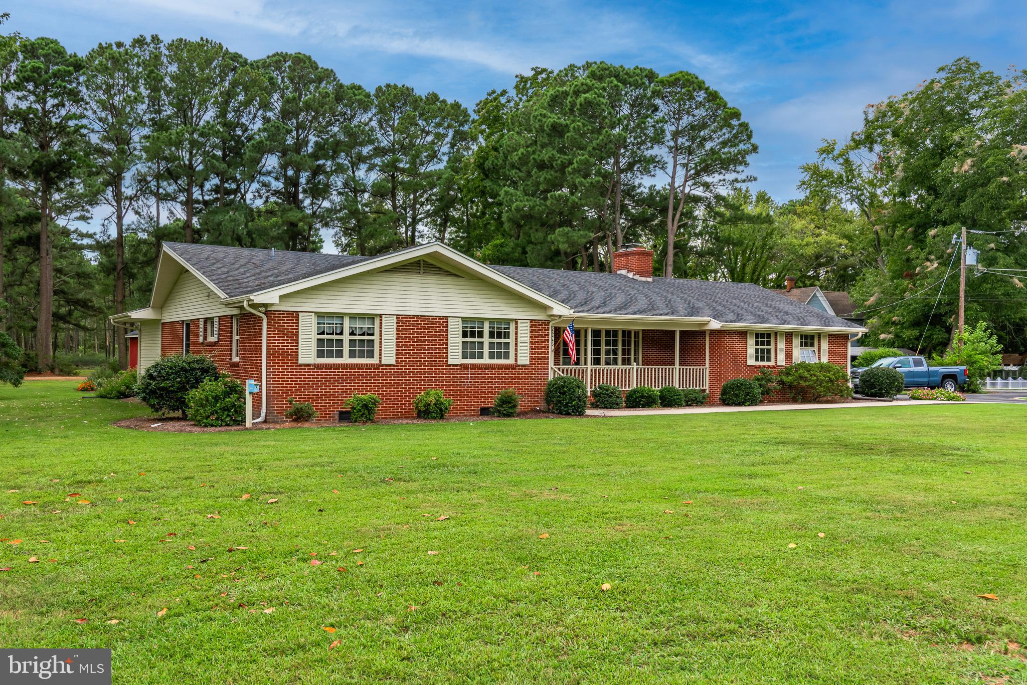 Looking for a minimal maintenance home with all the bells and whistles?  Brick rancher on 2.93 acres has been updated in all the best ways, completely remodeled kitchen, family room, dining room, primary bath and utility area. Encapsulated crawl space eliminates moisture related problems, limits allergens, and helps with heating and cooling bills. Roof, gutters and fascia were replaced in 2018 and 2017. Gorgeous kitchen with granite counters, wine bar, LVP flooring, stainless appliances.  Primary bedroom has two walk in closets and another closet, double doors open to ensuite bathroom with deep soaking tub, walk in shower, quartz countertops.  Large formal living room with fireplace for entertaining, family room also has wood burning fireplace, both have been cleaned, and are ready for a cozy fire!  Single car garage has work bench and freezer.  Landscaped and manicured lawn with patio overlooking back yard.  Separate lot included in 2.93 acreage could be a building site.  Don't forget the three season porch at the rear for your morning coffee! Air conditioning unit is just two months old!