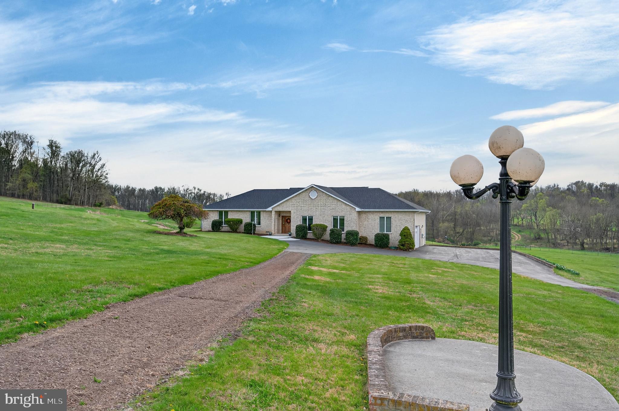 Located in the scenic Shenandoah Valley, this beautifully updated single-family home offers the perfect blend of rural tranquility and modern convenience. Set on approximately 16.6 acres of open, level pasture, the property is ideal for those seeking space, privacy, and versatility.

The home features 3 bedrooms, 3 full bathrooms, and approximately 2,362 square feet of living space, all thoughtfully laid out on a single level. Originally built in 1996, it has been updated in 2025 with fresh interior paint, refinished hardwood floors, updated bathroom, and new carpeting in the bedrooms. The kitchen is equipped with new stainless-steel appliances, enhancing both functionality and style. 

Constructed with a classic brick exterior, the home includes a cozy gas log fireplace, central air conditioning, and forced-air heating. A two-car attached garage and private driveway provide ample parking. 

The expansive acreage is well-suited for agricultural or recreational use. The property includes a 4-stall horse barn with power and water, fencing, and additional space for gardening, livestock, or small-scale farming. The land is mostly cleared and accessible via a quiet private road, offering a peaceful, low-traffic setting. 

Additional highlights include:
Private well and septic system
Fiber optic internet availability (ideal for remote work)
No HOA restrictions
Workshop/storage space within the barn

This property presents a rare opportunity to own a move-in-ready home with acreage in a private yet accessible location.