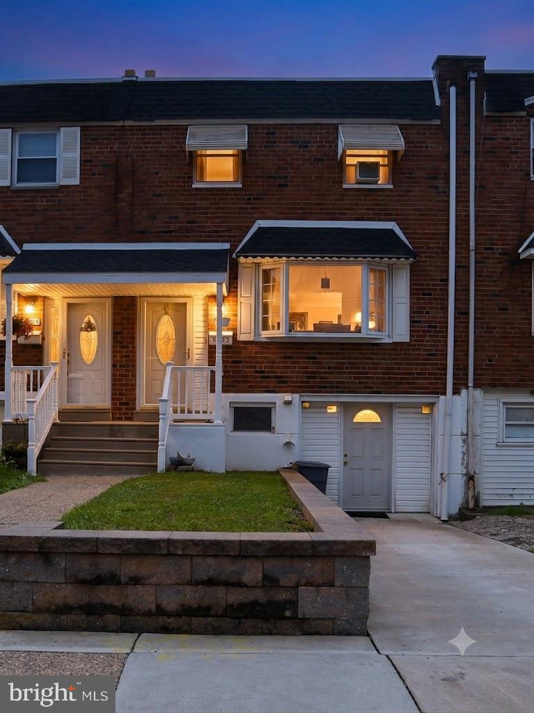 Welcome home to 12323 Dunks Ferry Rd, a charming rowhome situated in highly desirable Parkwood neighborhood in Northeast Philadelphia. Boasting great curb appeal, the front yard features a beautifully maintained EP Henry-style block retaining wall alongside convenient driveway parking.
Inside, you will find a spacious layout featuring 3 bedrooms, 1 full bath, and 2 half baths (!), all kept perfectly cool and comfortable with central air conditioning and heating. The main level offers a spacious living room that connects to a wide-open kitchen and dining area with ample cabinet space: perfect for family meals and daily living. Additionally, peace of mind comes included thanks to a recently replaced sewer line and a one-year home warranty from America's Preferred!
What truly sets this home apart is its fully finished walkout basement. Designed with entertainment in mind, this lower level includes a built-in bar, a second powder room (!), and both front and rear exterior entrances, making it an exceptional setup for hosting guests, a home office, or a private recreation hub.  Convenient laundry and front storage room round out the basement space.  Step out the back to a fenced-in rear yard ready for summer barbecues. Don't miss out on this fantastic Northeast Philly gem! (Some photos have been virtually staged and are labeled as such).
