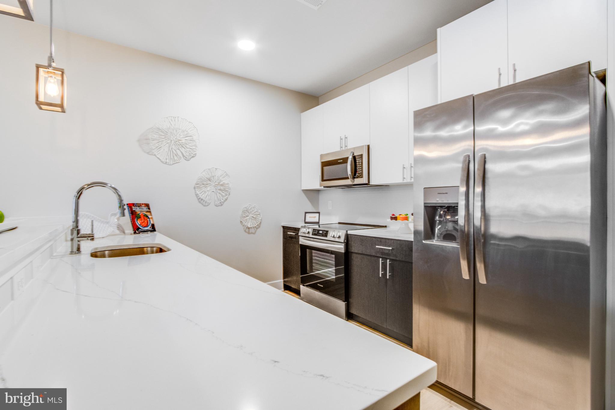 FLATS AT COASTAL STATION - Residential