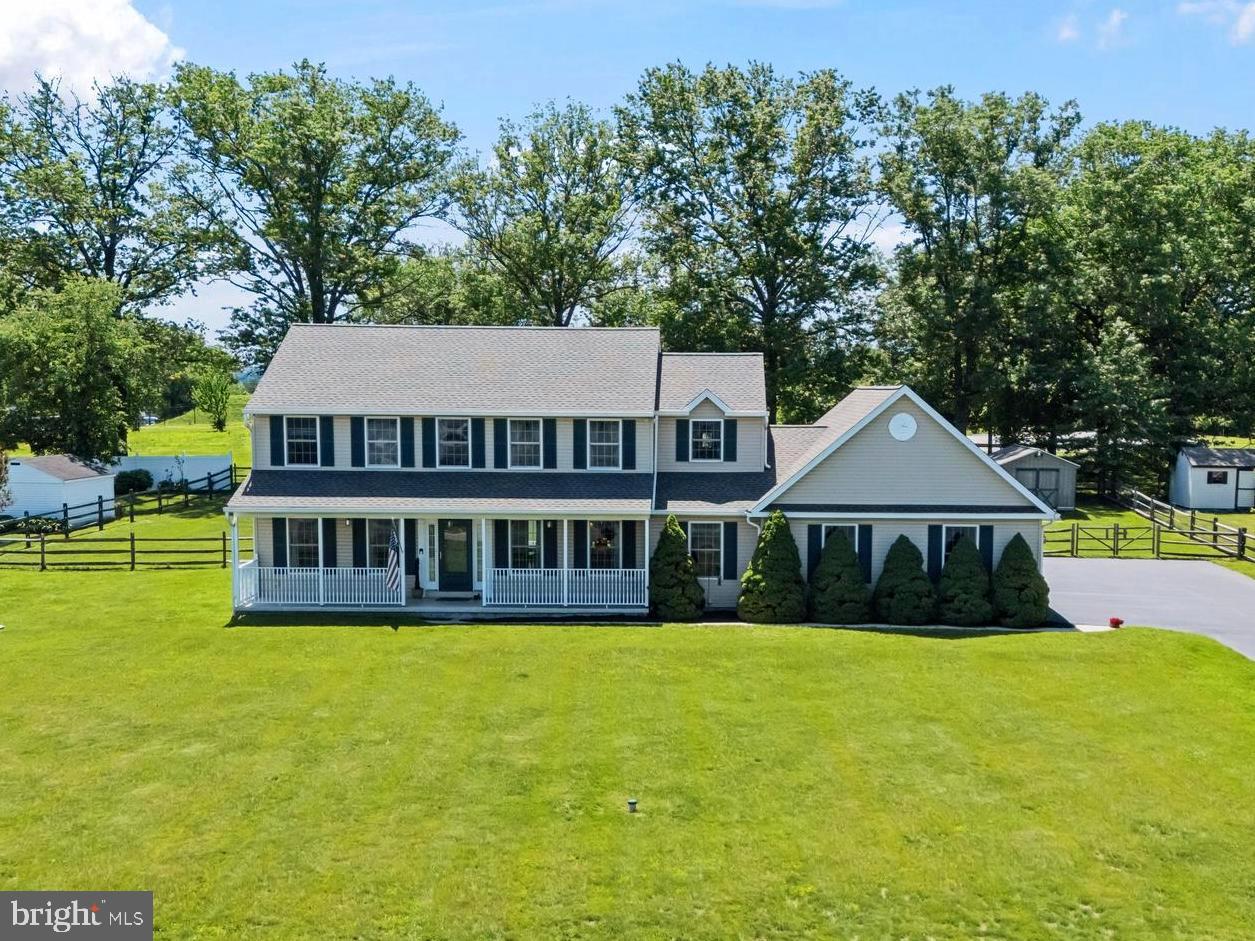 This stunning 4-bedroom, 4-bathroom home offers the perfect blend of timeless craftsmanship and modern convenience in the Phoenixville Borough. Set on a generous .72-acre parcel that backs directly up to a beautiful Borough park, this property provides exceptional privacy and outdoor enjoyment while being within easy walking distance to Phoenixville’s shops, restaurants, and amenities.
Step inside to beautiful solid oak hardwood floors that flow throughout the entire first level. The spacious kitchen is a dream, featuring granite countertops, a large center island with seating, double electric ovens, two sinks for food prep, and a convenient walk-in pantry. Just off the kitchen sits a front den/office, ideal for remote work or everyday use. The main level also includes a formal dining room and a generous living room anchored by a cozy fireplace, which opens to an additional sitting room or front office—creating flexible spaces perfect for entertaining or relaxing.
Upstairs, you’ll find new carpet on the steps and hallway leading to three spacious secondary bedrooms and a well-appointed full bathroom. The luxurious master suite is a standout, complete with a private sitting/dressing room, an oversized walk-in closet, and a large master bathroom for ultimate comfort and retreat.
Outside, enjoy the low-maintenance composite deck with retractable awning—perfect for year-round outdoor living. The reinforced driveway easily accommodates heavy-duty equipment or multiple vehicles, and the 3-car oversized attached garage provides ample storage. A powerful 20 kW Generac whole-house backup generator offers peace of mind during any power outage. The roof on the house and shed is brand new as of May 2026.
This rare combination of generous living space, high-end features, and an unbeatable location in Phoenixville Borough makes this home a true standout.