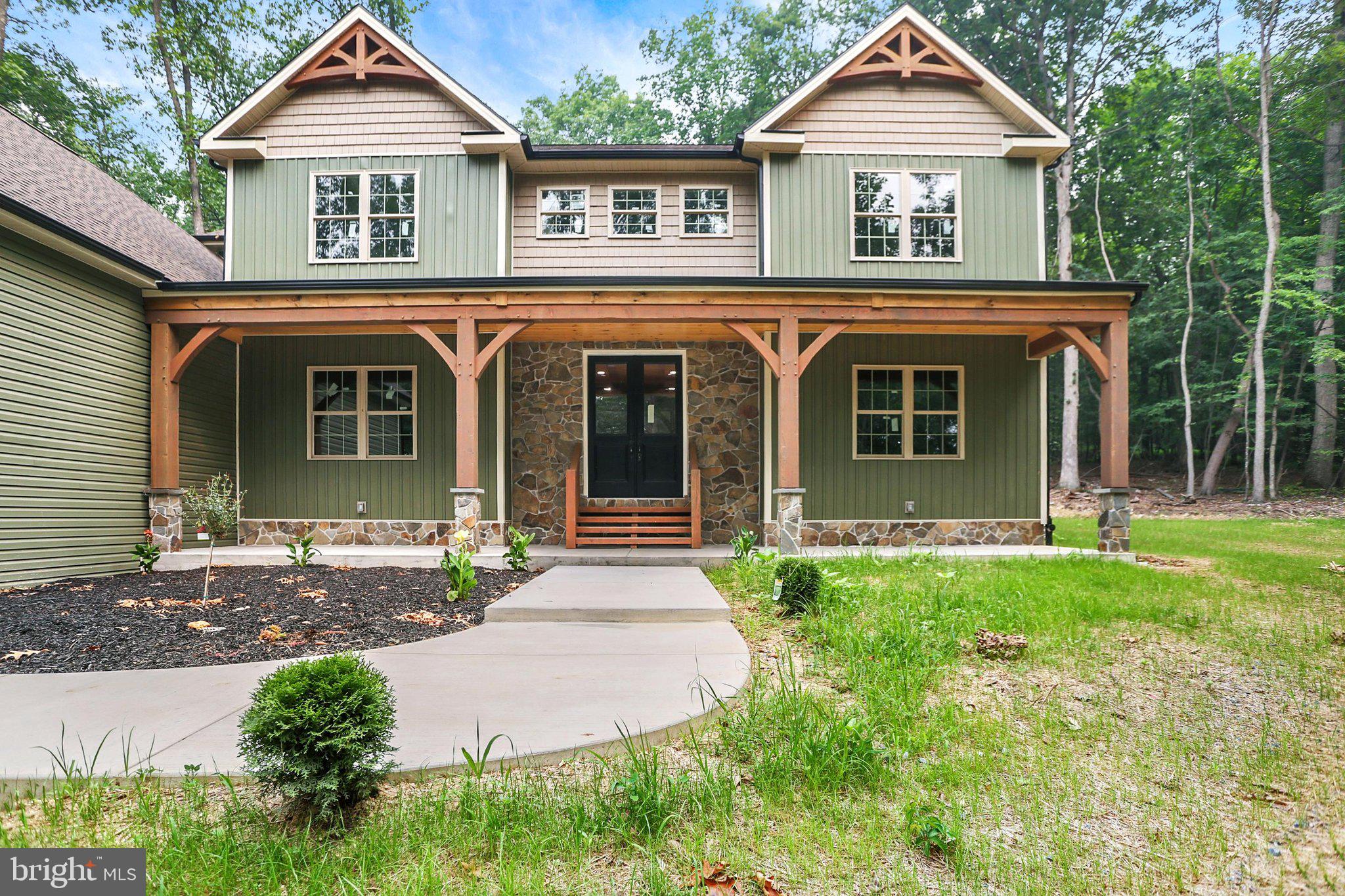 ***OPEN HOUSE: SATURDAY 7/25 FROM 1:00-3:00PM*** WELCOME TO YOUR DREAM HOME!! THIS IS EVERYTHING YOU HAVE BEEN LOOKING FOR!  TALK ABOUT LOCATION, LOCATION, LOCATION!  ABSOLUTELY STUNNING  5 BEDROOM, 3.5 BATH CRAFTSMAN STYLE HOME WITH 4033 SQ FT, NEWLY BUILT BY CASSELL HOMES WITH NO EXPENSE SPARED LOCATED ON 3.54 SECLUDED ACRE LOT IN NORTHERN YORK SCHOOL DISTRICT & CONVIENTLY LOCATED CLOSE TO RT 15 & RANGE END GOLF COURSE. THIS HOME WILL INSTANTLY GRAB YOUR ATTENTION FROM THE BEAUTIFUL CURB APPEAL, TRANQUIL SETTING ALONG WITH THE OVERSIZED 3 CAR SIDE ENTRY GARAGE.  IT ONLY GETS BETTER ONCE YOU WALK IN THE FRONT DOOR.  YOU WILL EXPERIENCE AN OPEN FOYER WITH LOTS OF NATURAL LIGHT, CHARACTER & CHARM.  THIS HOME BOASTS A PRIVATE OFFICE/DEN WITH FRENCH DOORS, CUSTOM WHITE OAK HARDWOOD FLOORS, CROWN MOLDING, WAINSCOTTING, PA FIELDSTONE FIREPLACE (PROPANE), CASSELL HOMES SIGNATURE CUSTOM TIMBER FRAMING, GORGEOUS KITCHEN WITH HIGH END FORNO APPLIANCES, WALK-IN PANTRY, HUGE ISLAND, GRANITE COUNTERS & CUSTOM CABINETS.  1ST FLOOR LAUNDRY & 1ST FLOOR MASTER SUITE WITH WALK-IN CLOSET & PRIVATE BATHROOM FEATURING TILED SHOWER, DOUBLE SINK VANITY & SOAKING TUB.  THE 2ND FLOOR CONSISTS OF A LOFT & 4 LARGE BEDROOMS ALL WITH WALK-IN CLOSETS. 
 LOOKING FOR MORE SPACE? THE BASEMENT IS MASSIVE WITH HIGH CEILINGS THAT COULD BE EASILY FINISHED.  ENJOY YOUR MORNING COFFEE ON YOUR COVERED FRONT PORCH & YOUR EVENING COCKTAIL AND COOKOUT ON YOUR COVERED PATIO OVERLOOKING PRIVATE WOODED LOT.  THIS IS AN ABSOLUTE MUST SEE HOUSE!