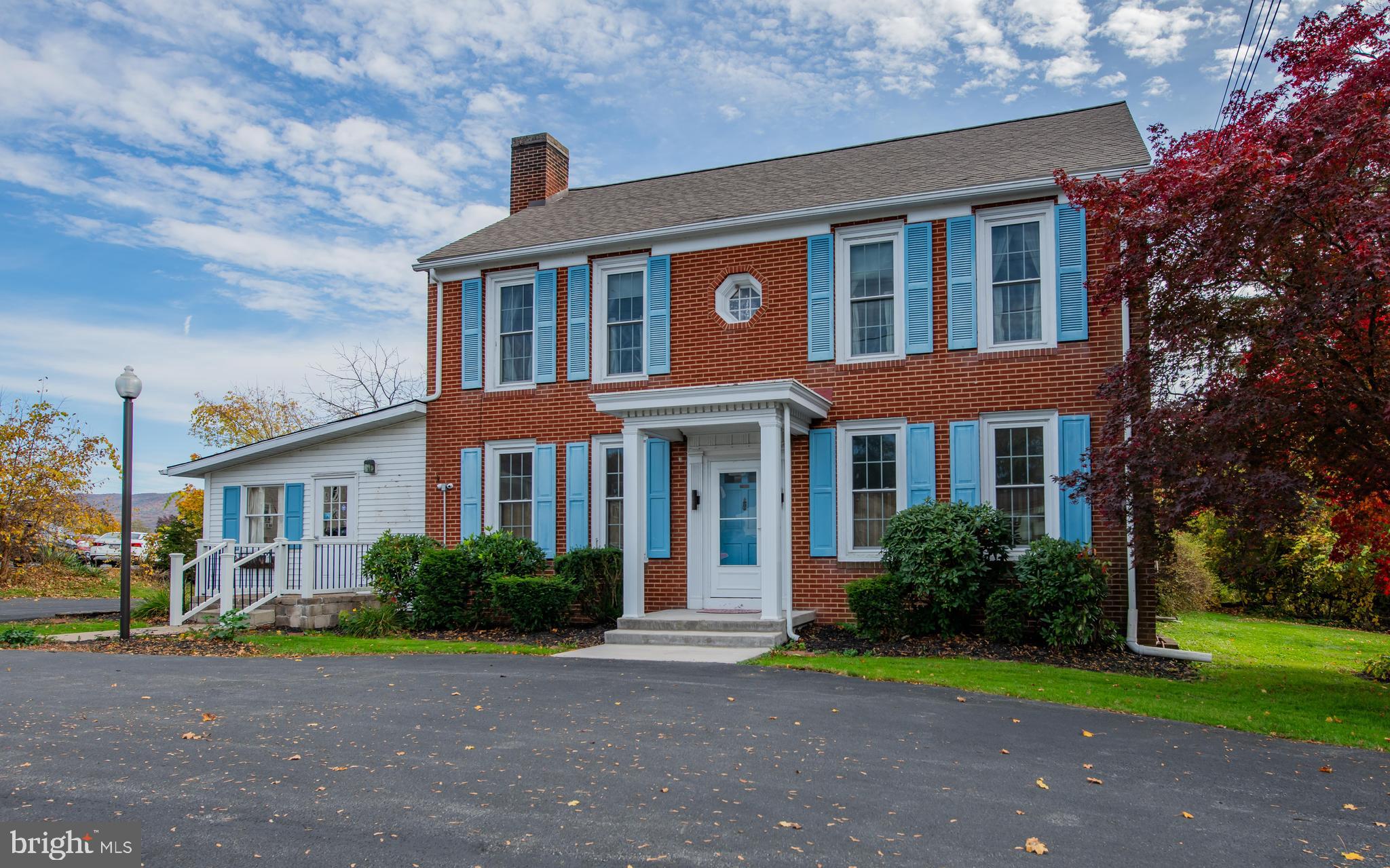 What a find near town! This well-built Brick Colonial 2 story home with an attached office on 2.05 ACRES! Some many possibilities. There is a detached heated garage, A large Pole Barn and kennels in the back yard. Access from the rear is also available with a little clearing. Could be sold Furnished.